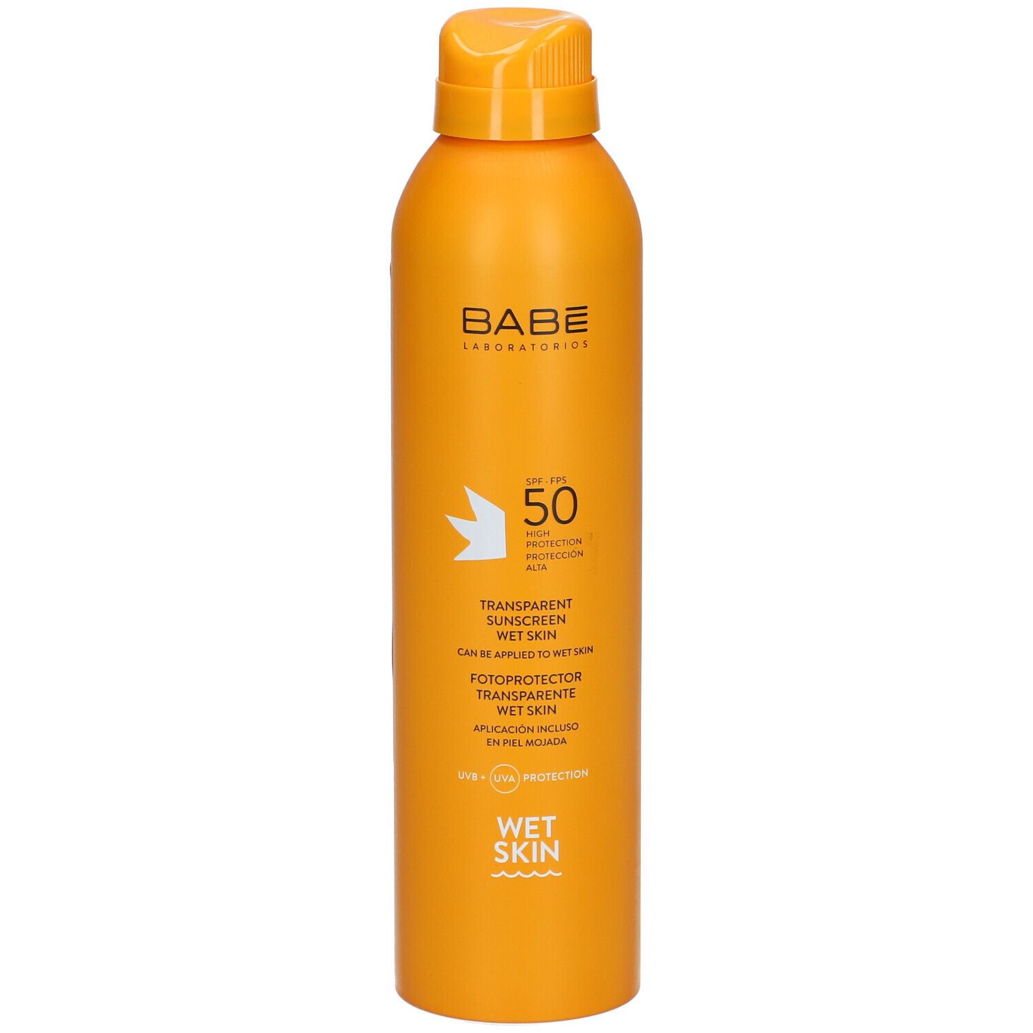 Flacon spray orange avec bouchon jaune. Inscriptions: BABÉ, SPF 50, Transparent Sunscreen Wet Skin. Nom du produit et marque visibles.