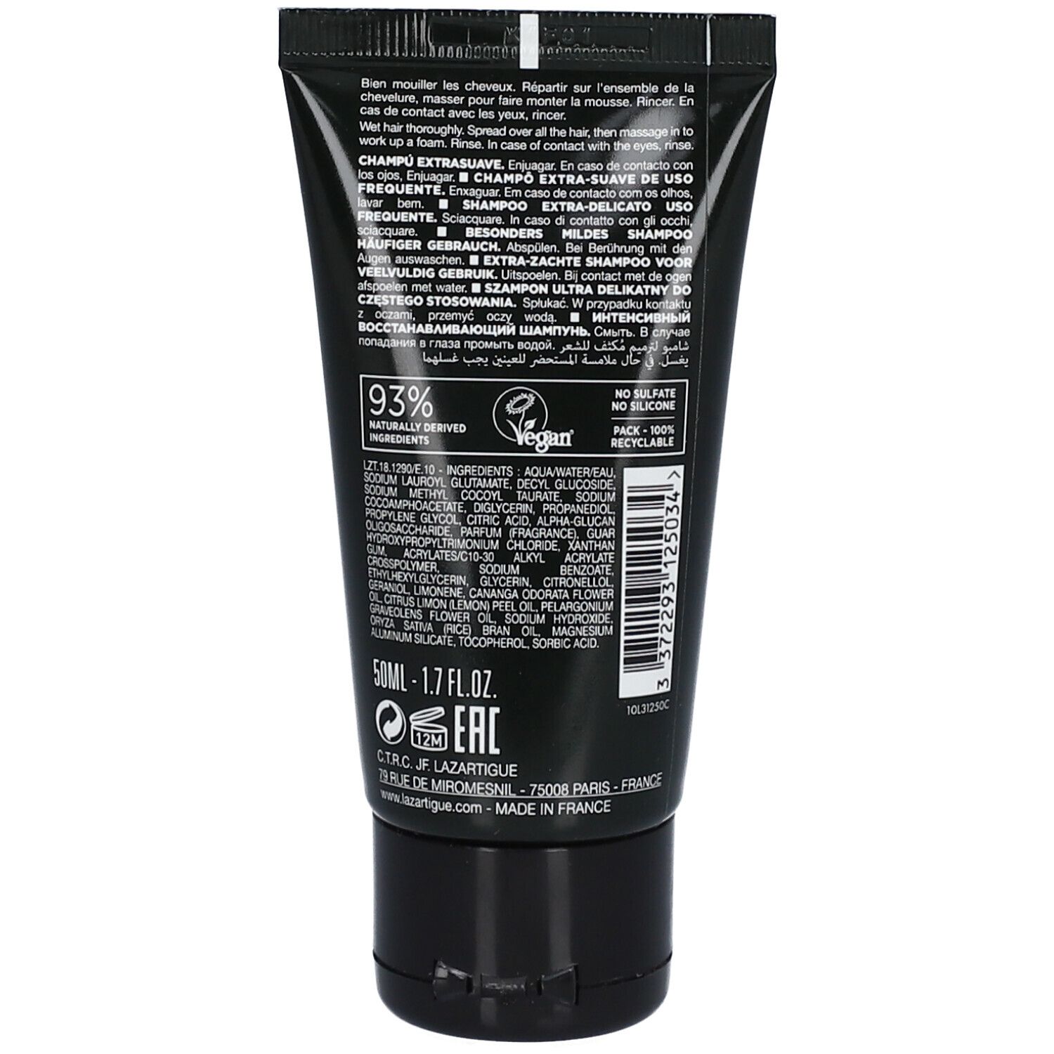 Rückseite einer schwarzen Tube. Text in mehreren Sprachen. Enthält 93% Inhaltsstoffe natürlichen Ursprungs. Vegan.