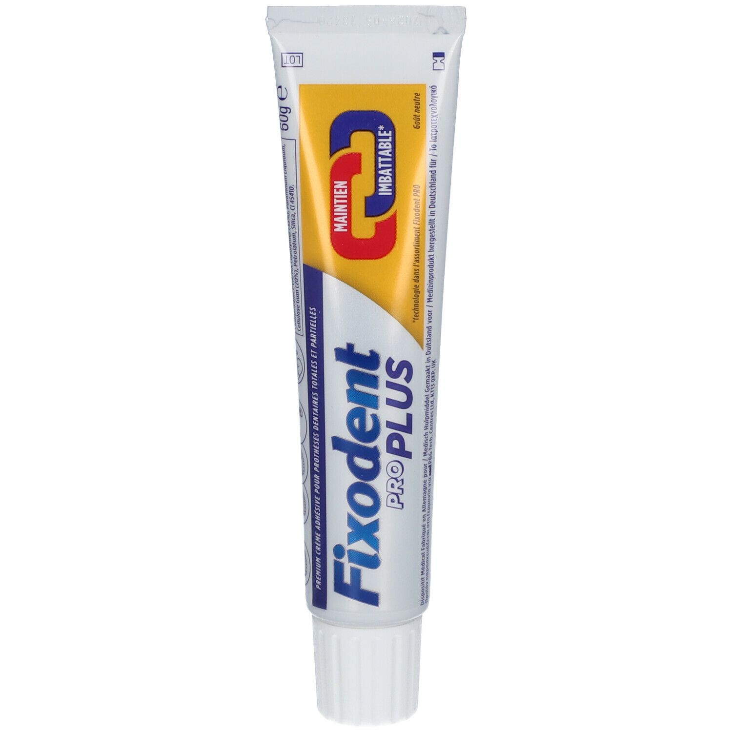 Fixodent Pro Plus tandpasta tube. Wit, blauw, geel. Opschrift en logo zichtbaar. Met schroefdop.
