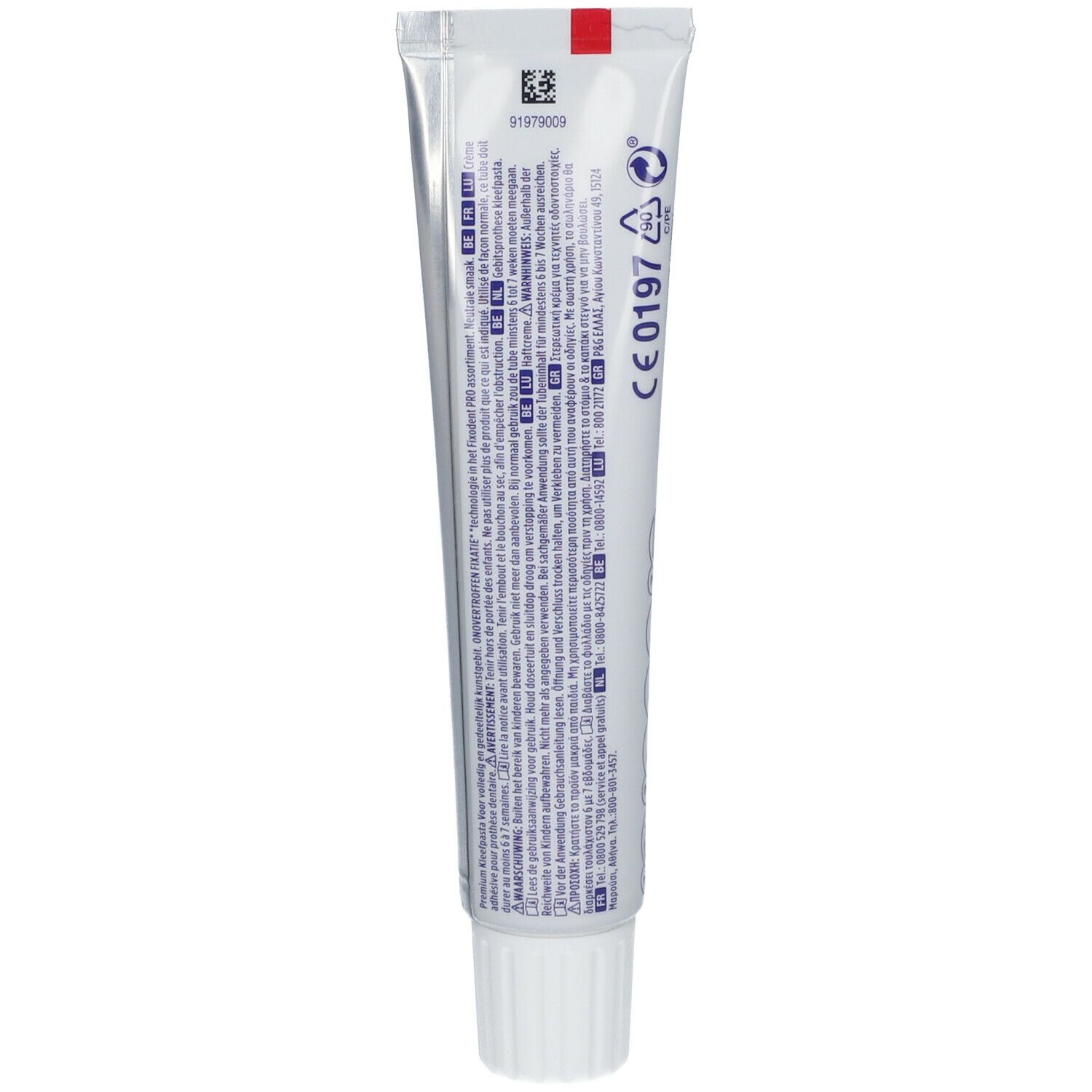 Achterkant van de Fixodent Pro Plus tube. Meertalige tekst. Rode streep. Schroefdop.