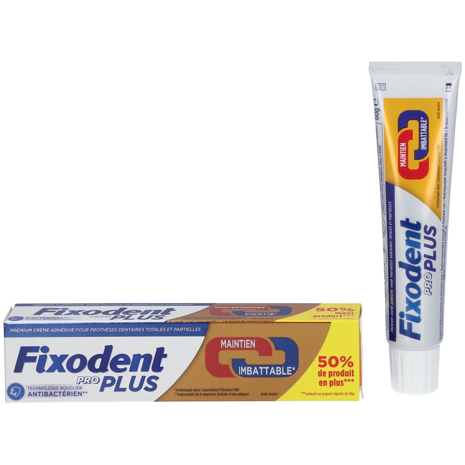 Fixodent Pro Plus tube en verpakking. Tube staat naast de doos. Opschrift en logo zichtbaar.