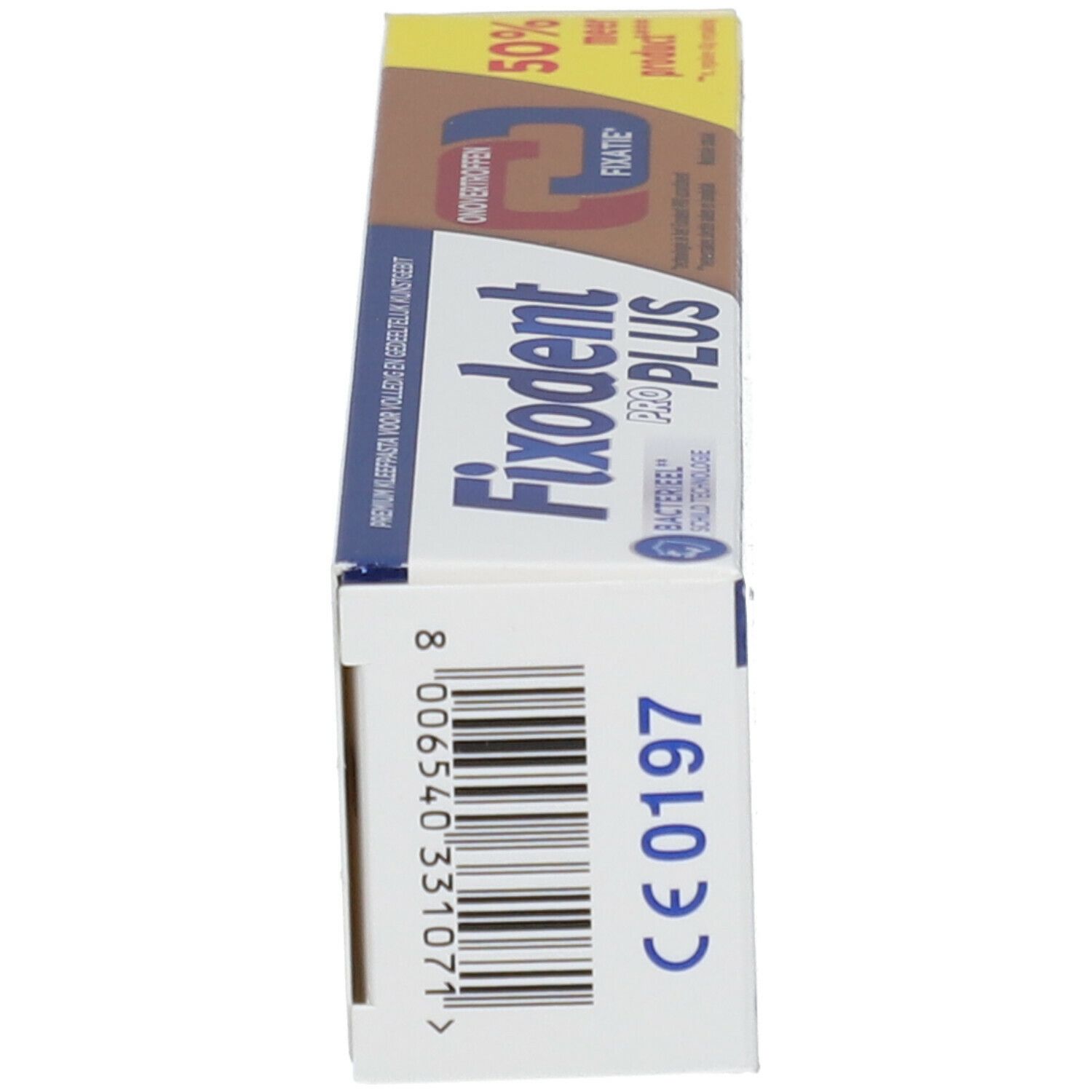 Fixodent Pro Plus verpakking, zijaanzicht. Blauw, bruin, wit. CE-markering zichtbaar.