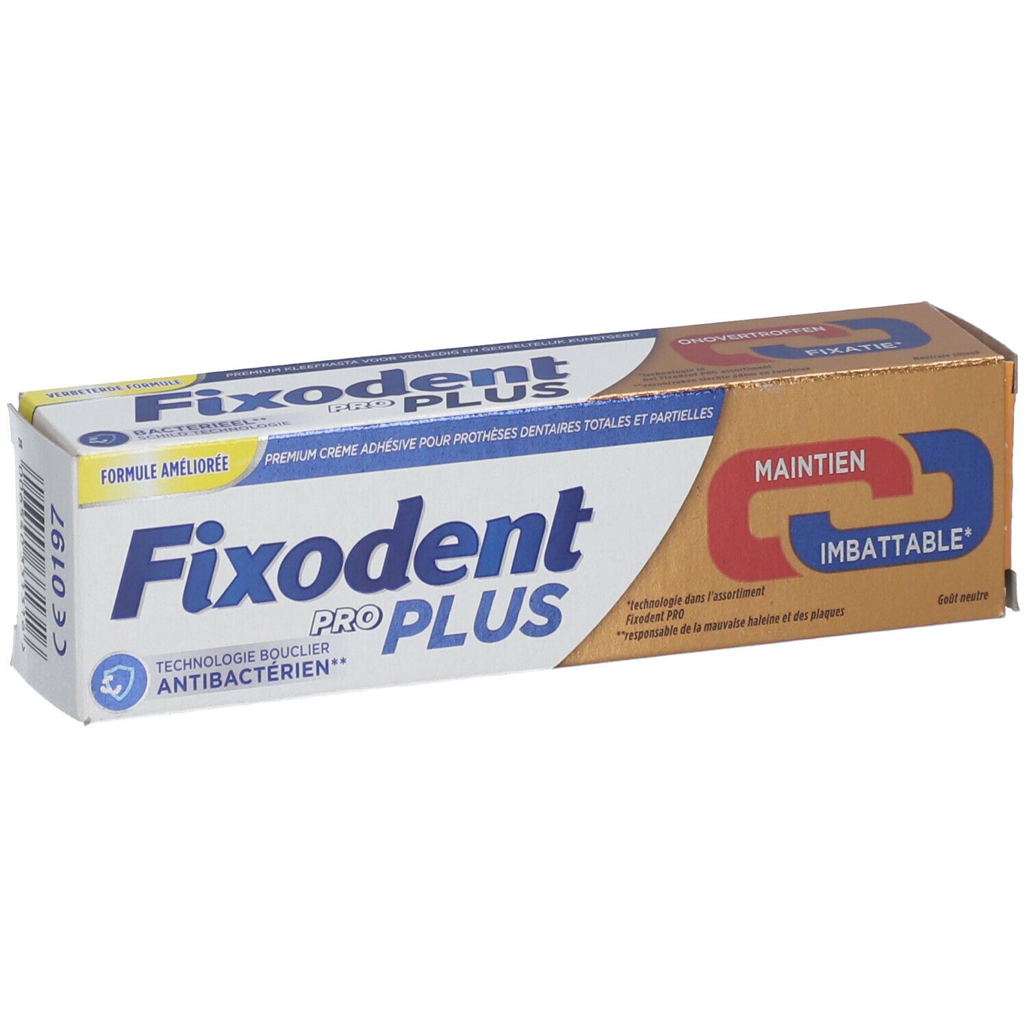 Fixodent Pro Plus verpakking. Blauwe en witte tekst, gouden achtergrond. Antibacterieel.
