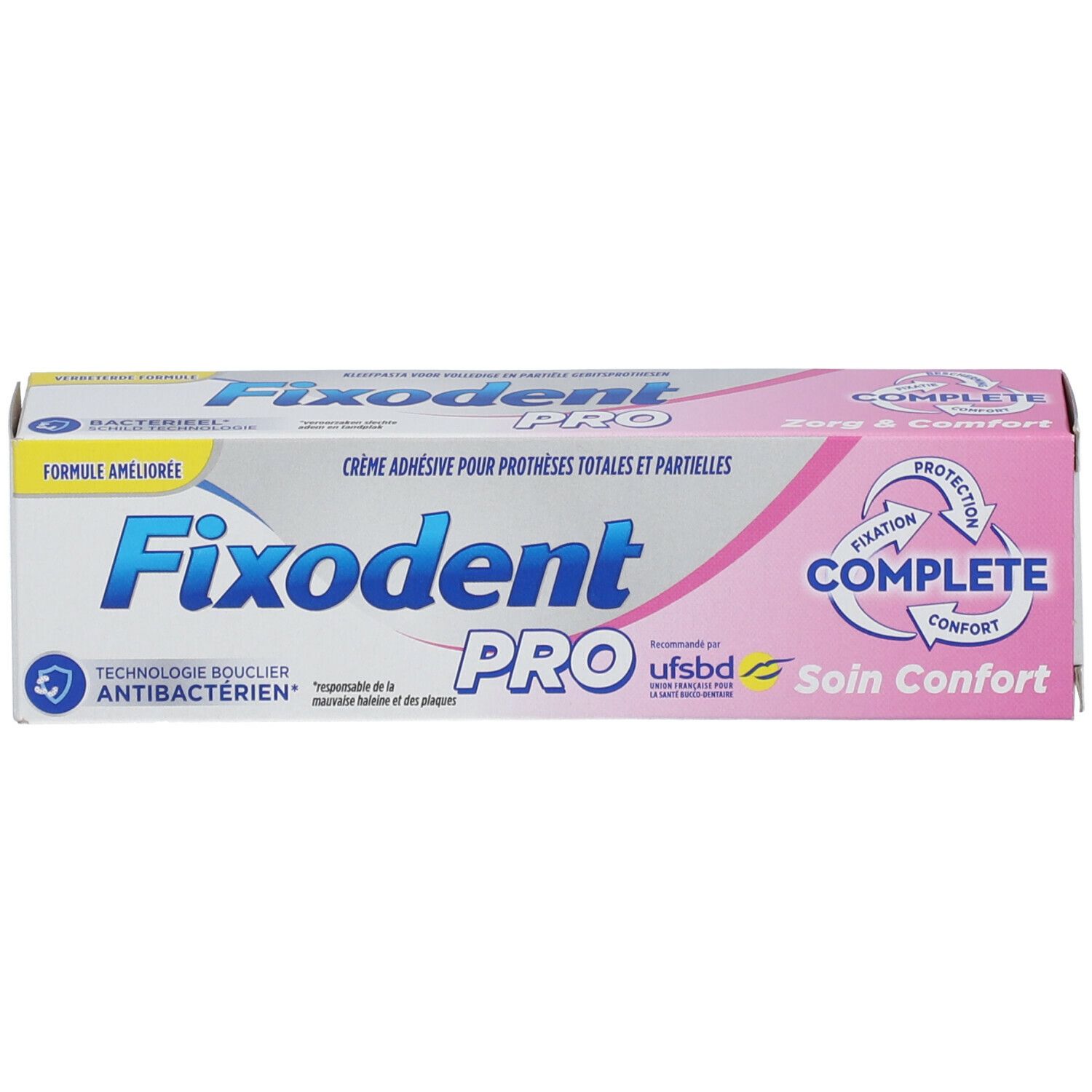 Boîte blanche et rose. Inscriptions: Fixodent Pro, Complete, Soin Confort. Antibactérien.