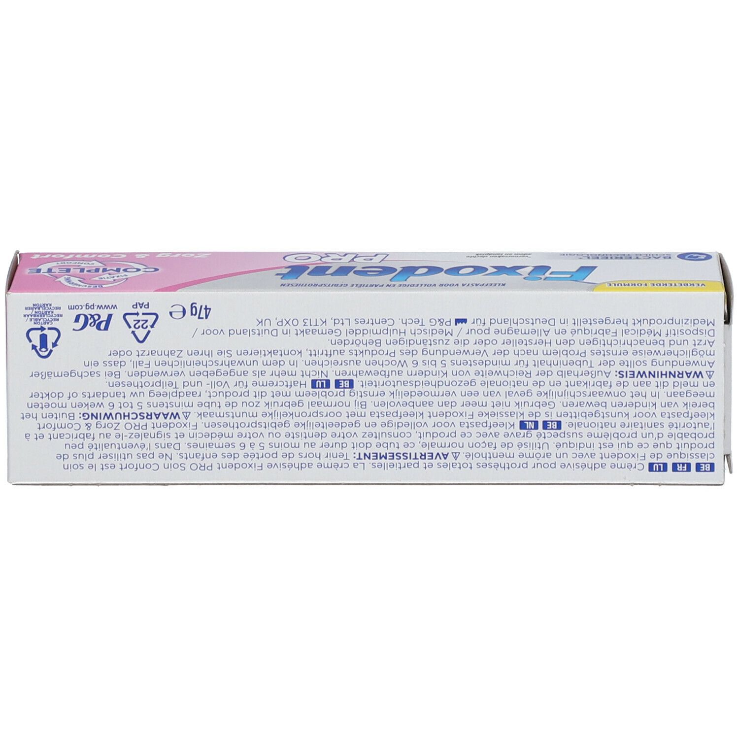 Dessus d'une boîte. Inscription: Fixodent Pro. Ingrédients et avertissements multilingues.