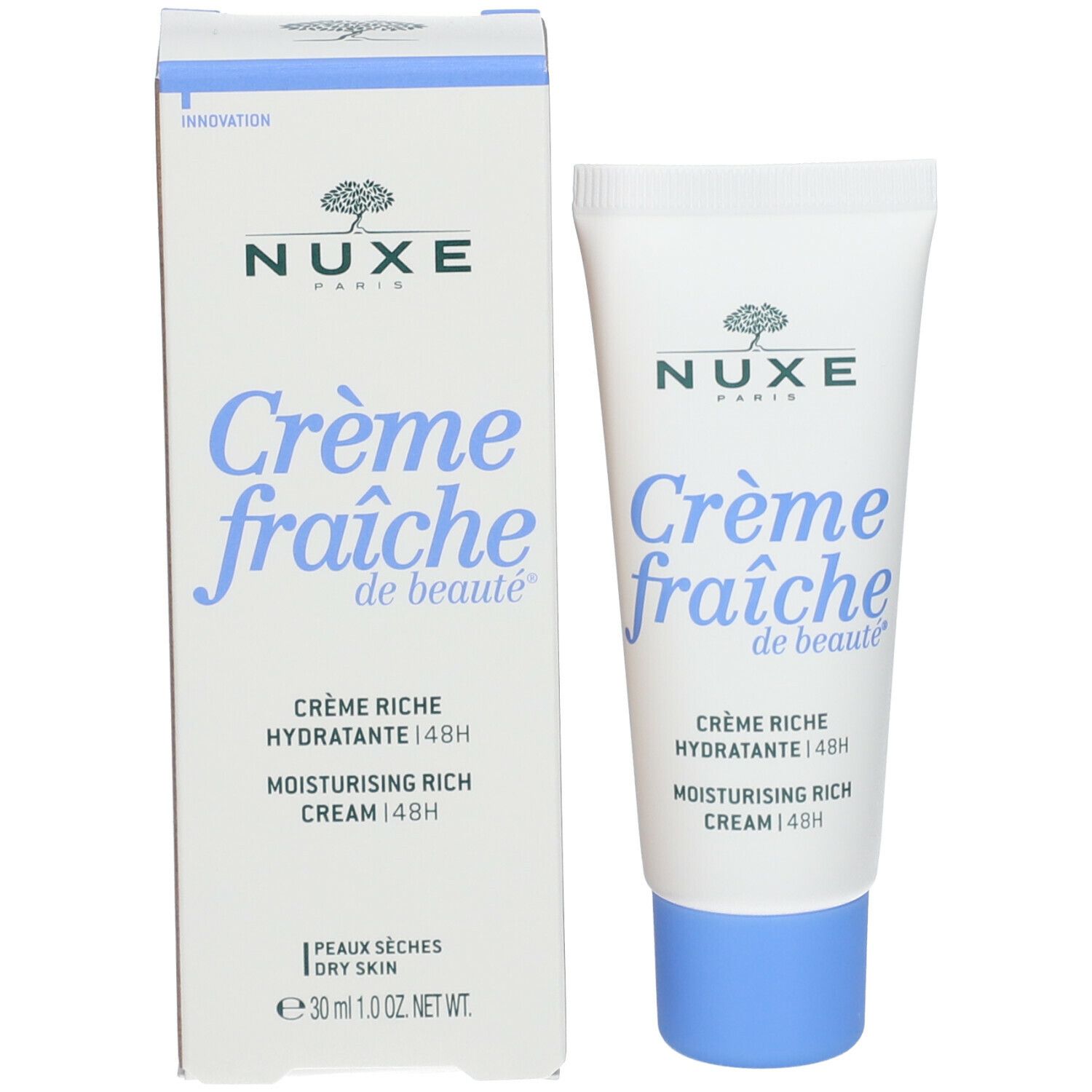 Produktverpackung und Tube. Verpackung: weiß mit blauer Schrift. Tube: weiß mit blauem Verschluss. Aufschrift: Nuxe, Crème fraîche de beauté.