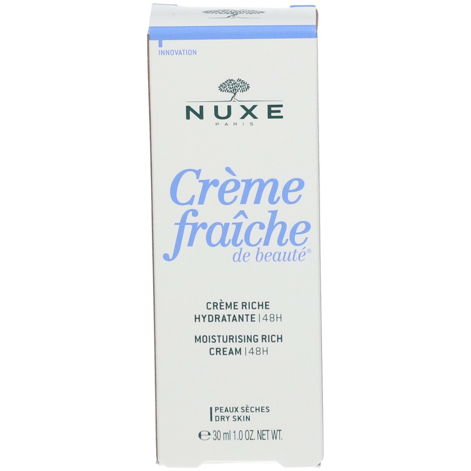 Weiße Produktverpackung mit blauer Schrift. Aufschrift: Nuxe, Crème fraîche de beauté, Crème riche hydratante 48H, Moisturising Rich Cream 48H.