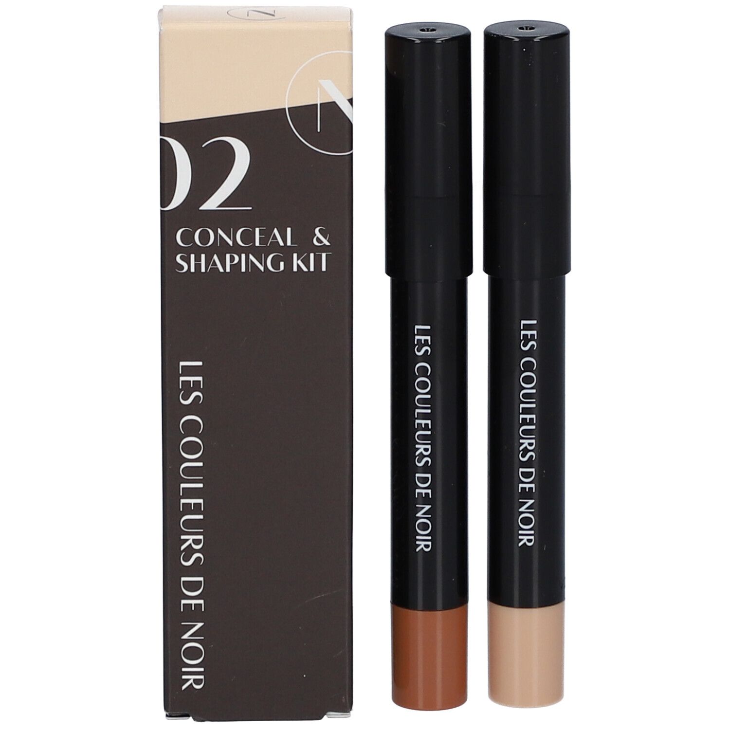 Zwei Stifte und eine Verpackung. Aufschrift: LES COULEURS DE NOIR. Auf der Verpackung: 02 CONCEAL & SHAPING KIT.