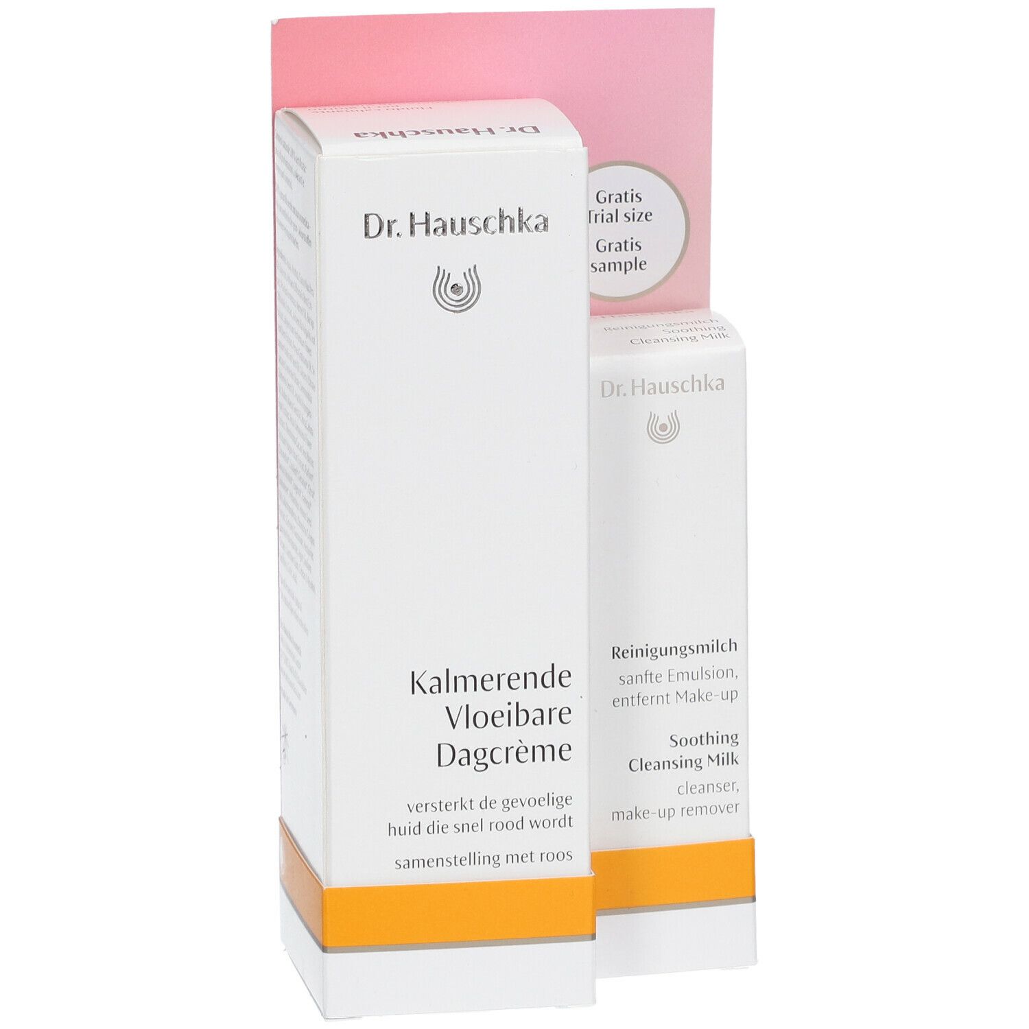 Twee witte productverpakkingen met tekst en logo. Eén verpakking is groter en draagt de tekst 'Kalmerende Vloeibare Dagcrème'.