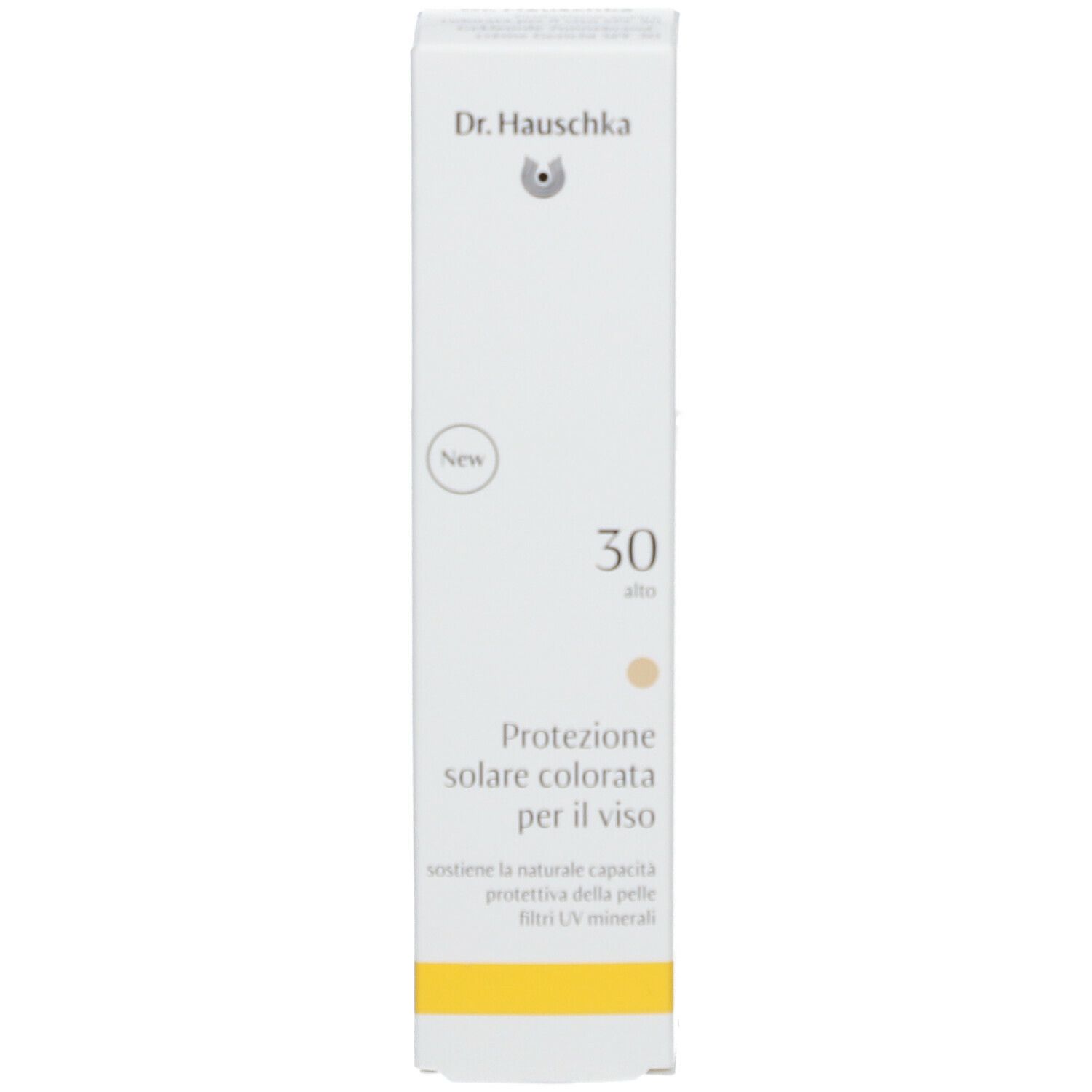 Weiße Schachtel. Aufschrift: Dr. Hauschka, 30, getönte Sonnencreme für das Gesicht. Gelber Streifen unten.