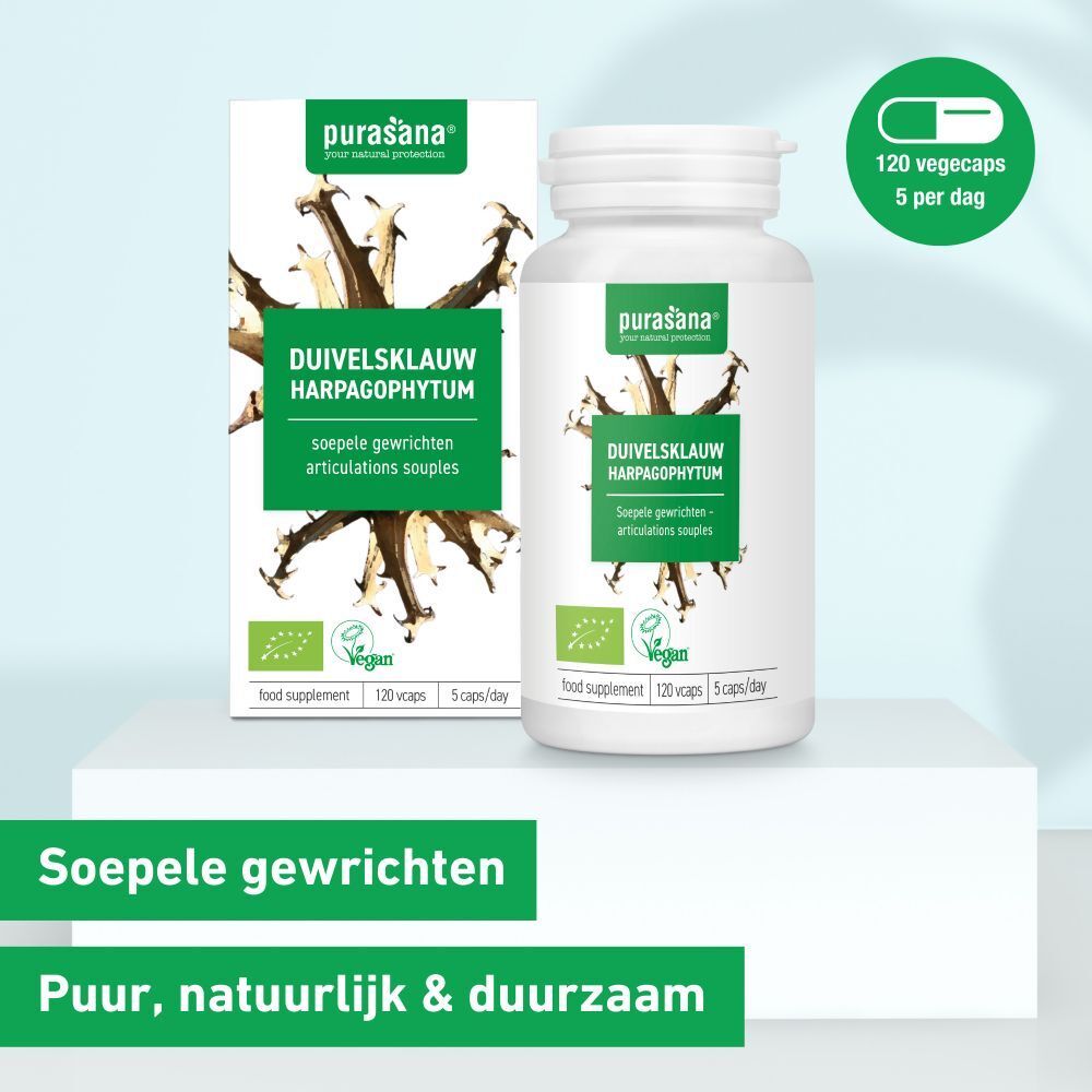 Verpakking en fles. Opschrift: DUIVELSKLAUW HARPAGOPHYTUM. Vegan logo. 120 capsules, 5 per dag. Doos met tekst.