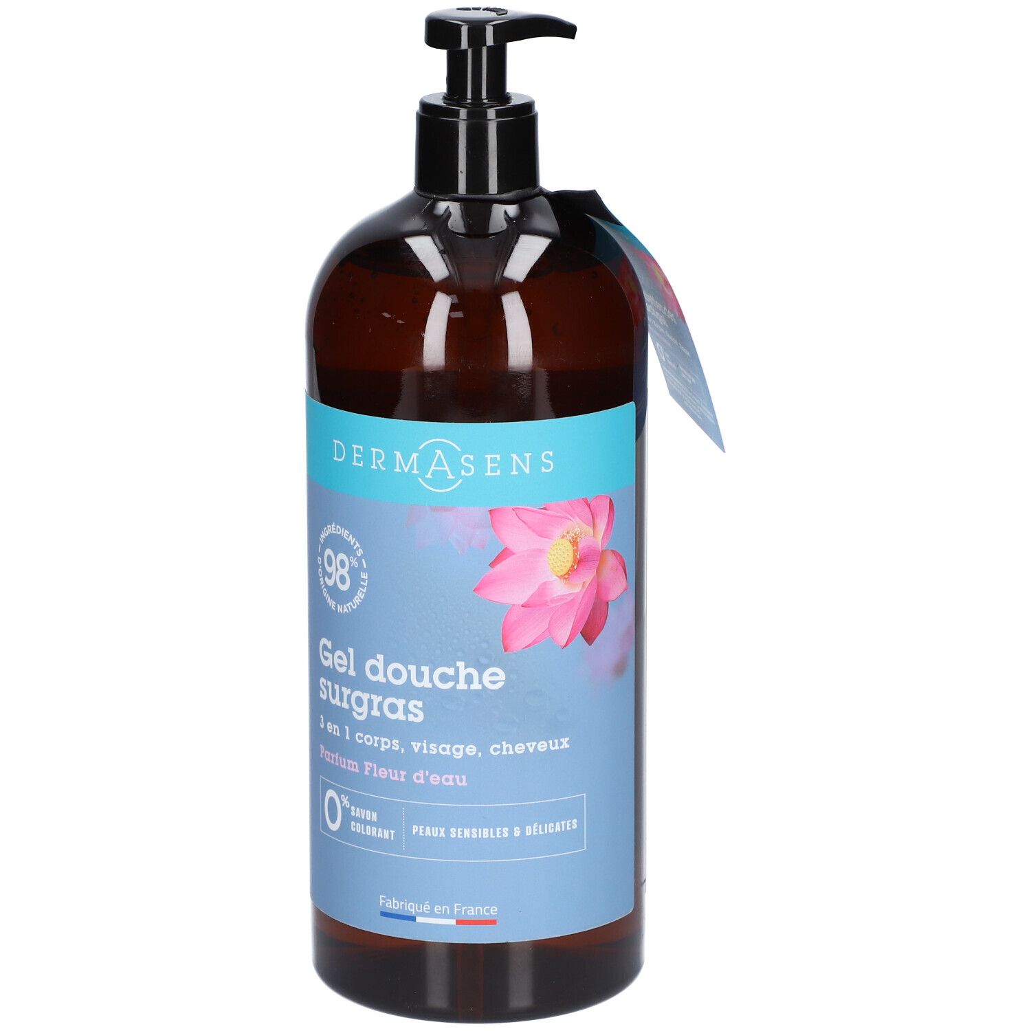 Flacon marron avec pompe noire. Étiquette avec nom du produit, logo et fleur de lotus. Étiquette avec informations.