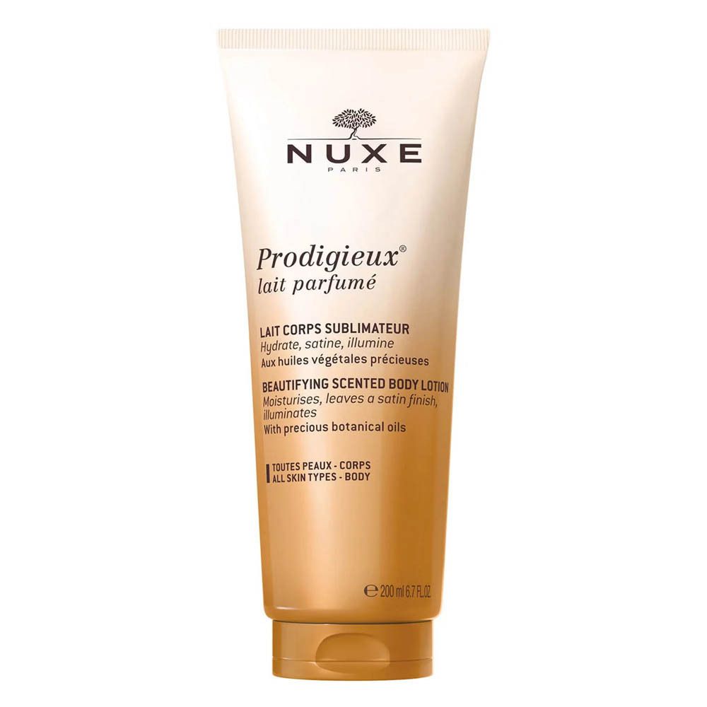 Tube beige avec logo Nuxe et nom du produit. Texte : Lait Corps Sublimateur, Beautifying Scented Body Lotion. Bouchon doré.