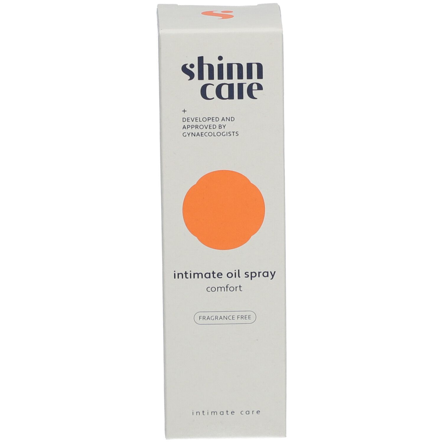 Verpackung. Weiße Schachtel mit orangefarbenem Kreis. Aufschrift: shinn care, Intimöl.