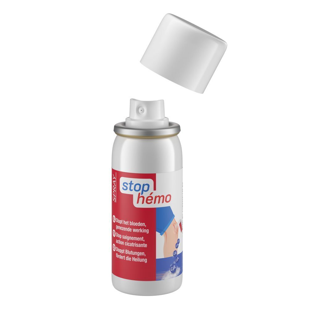 Flacon spray blanc avec bouchon détaché. Inscription: Stop Hémo Spray. Contient des informations en plusieurs langues.