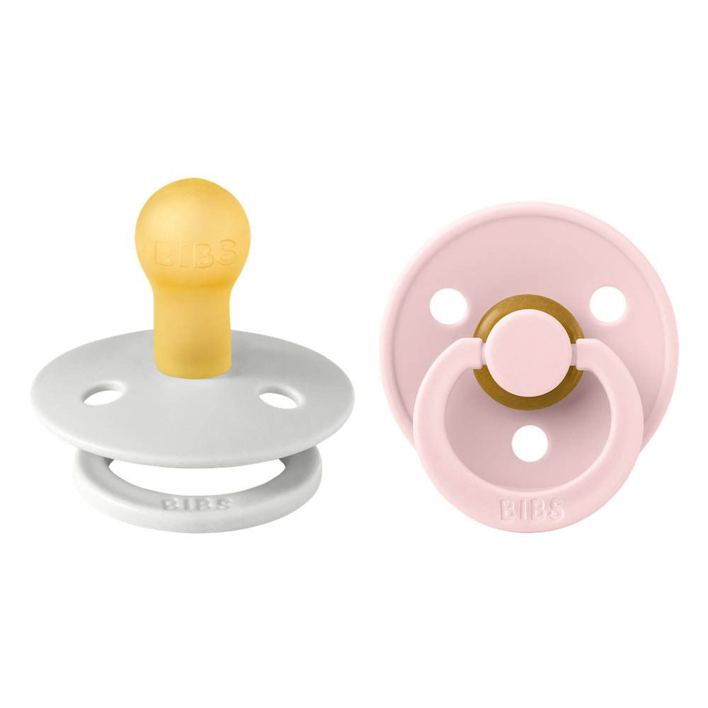 Twee fopspenen, één grijs, één roze. Ronde vorm, gele speen, ring met BIBS-opschrift.
