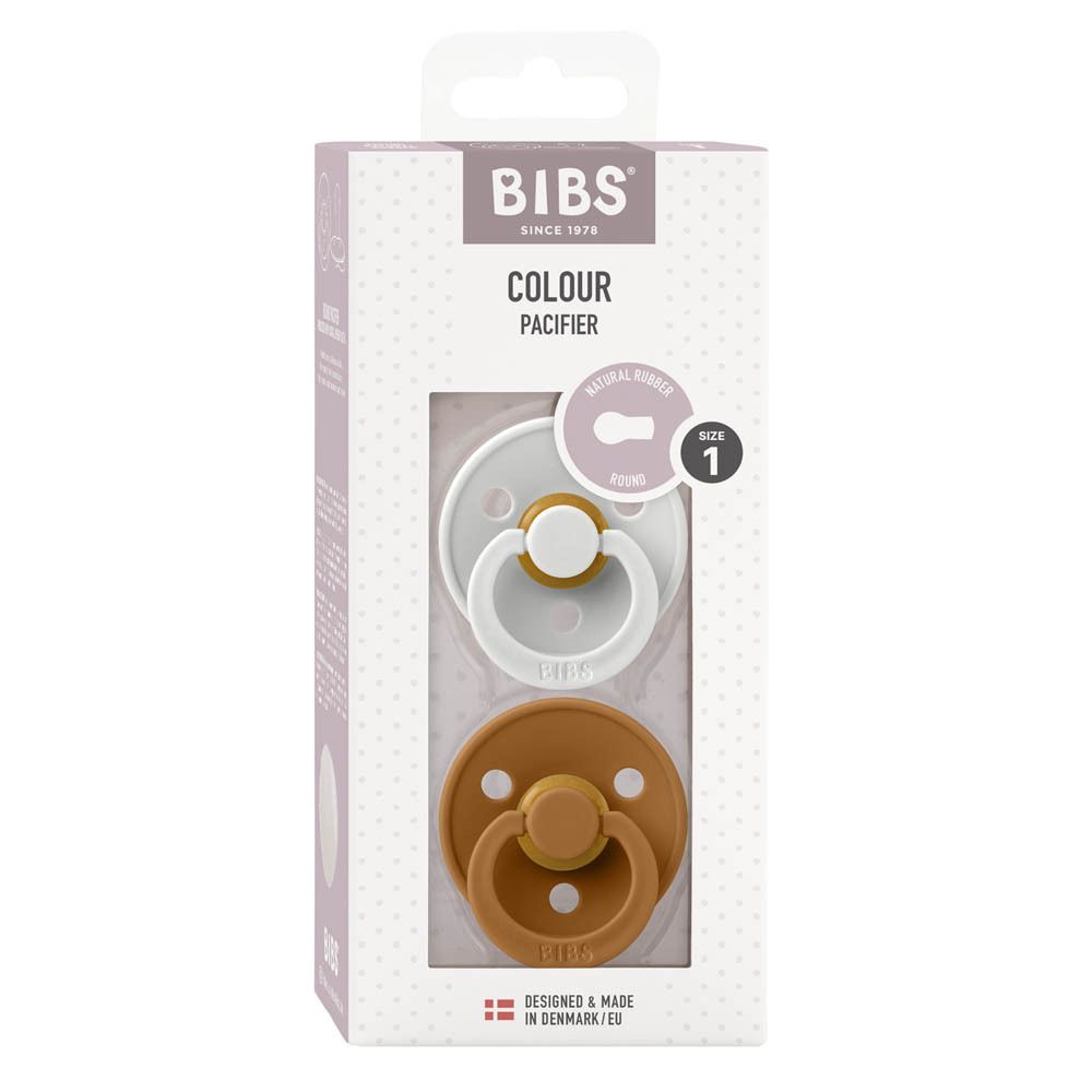 Emballage avec deux sucettes. Blanc et marron. Tétines rondes. Marque BIBS. Taille 1. 0-6 mois.