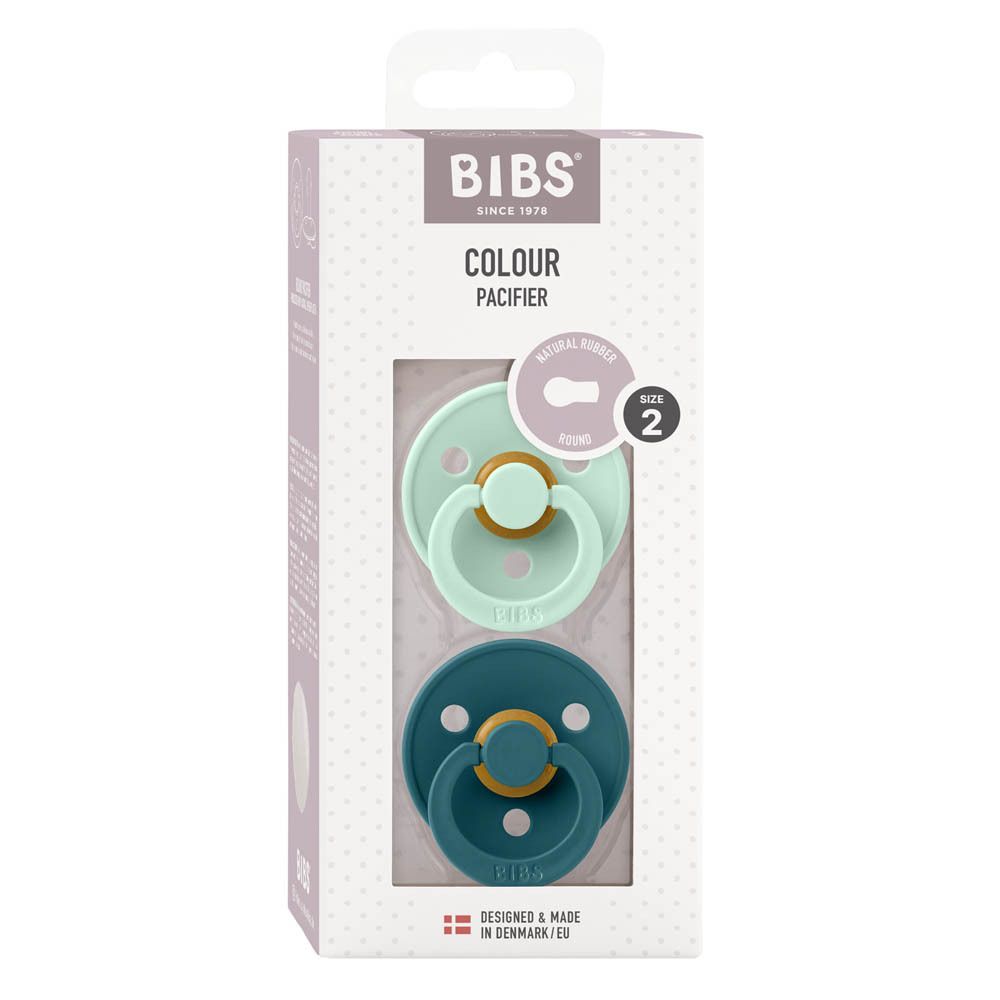 Verpakking met twee fopspenen. Mint en blauw. Merk BIBS, maat 2.