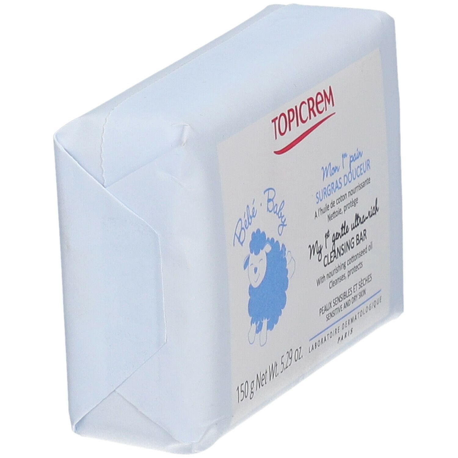Seife in Papierverpackung. Aufschrift: TOPICREM, Bébé Baby, Mon 1er pain, SURGRAS DOUCEUR.
