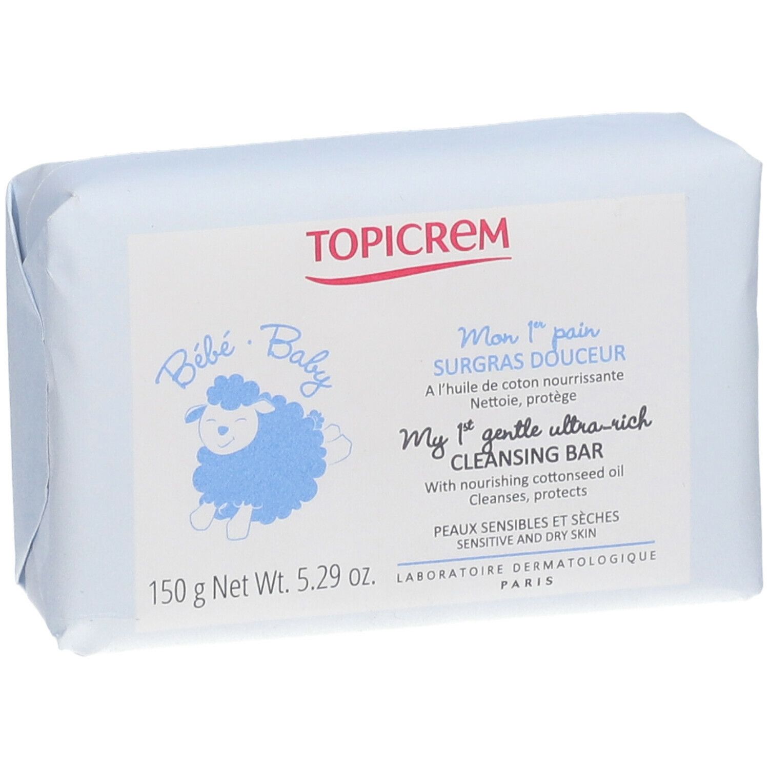 Seife in Papierverpackung. Aufschrift: TOPICREM, Bébé Baby, Mon 1er pain, SURGRAS DOUCEUR, 150 g.