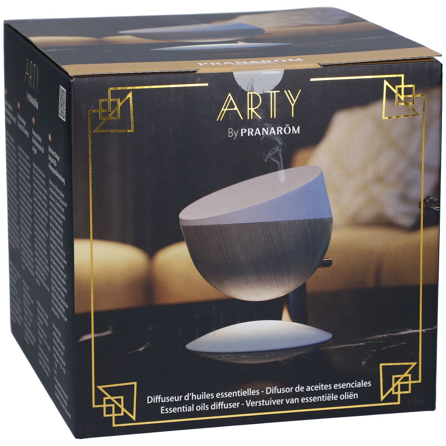 Zwarte doos met productafbeelding. Opschrift: "ARTY by Pranarôm". Onderaan: "Diffuser d'huiles essentielles". Stoom.