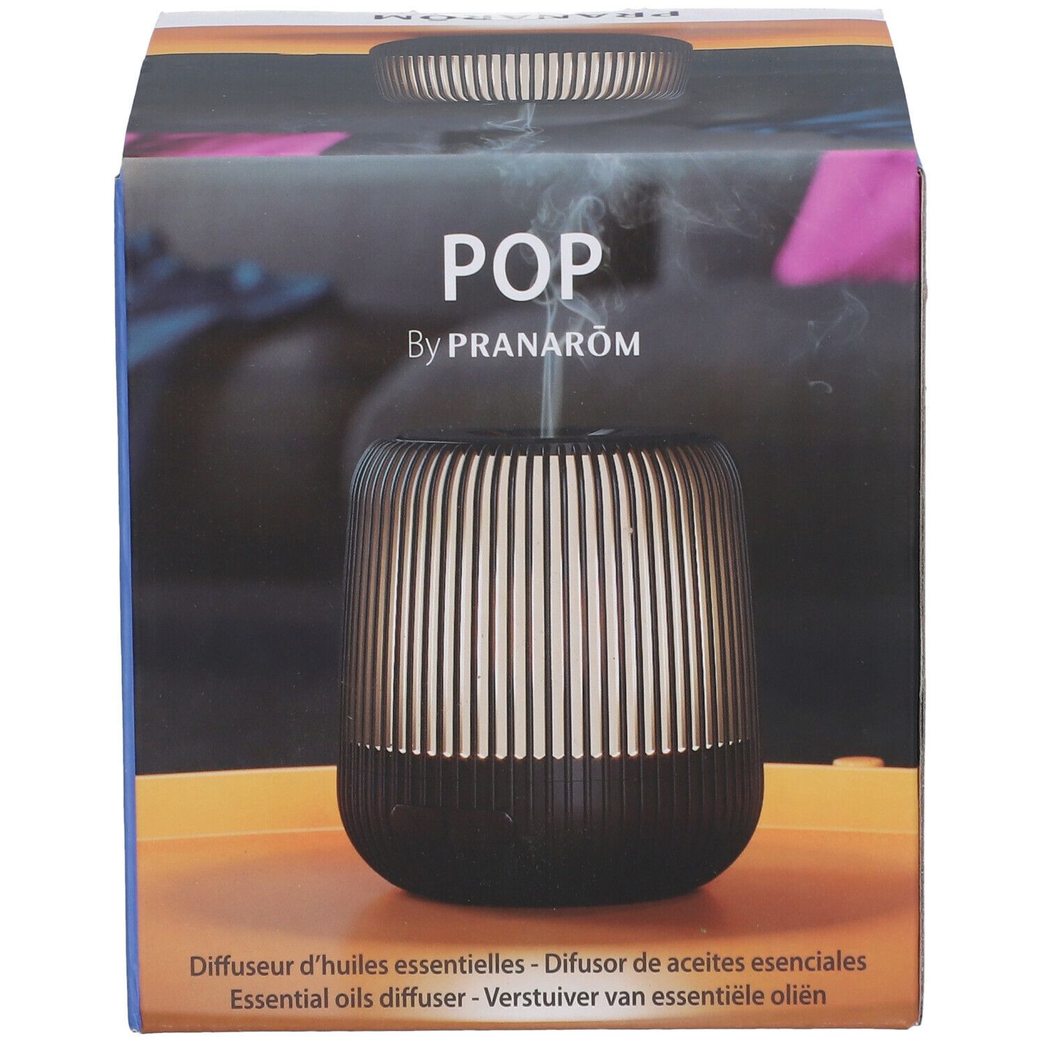 Diffuseur noir et doré, en boîte. Inscription: POP by Pranarôm. Texte: Diffuseur d'huiles essentielles. Vue de face.