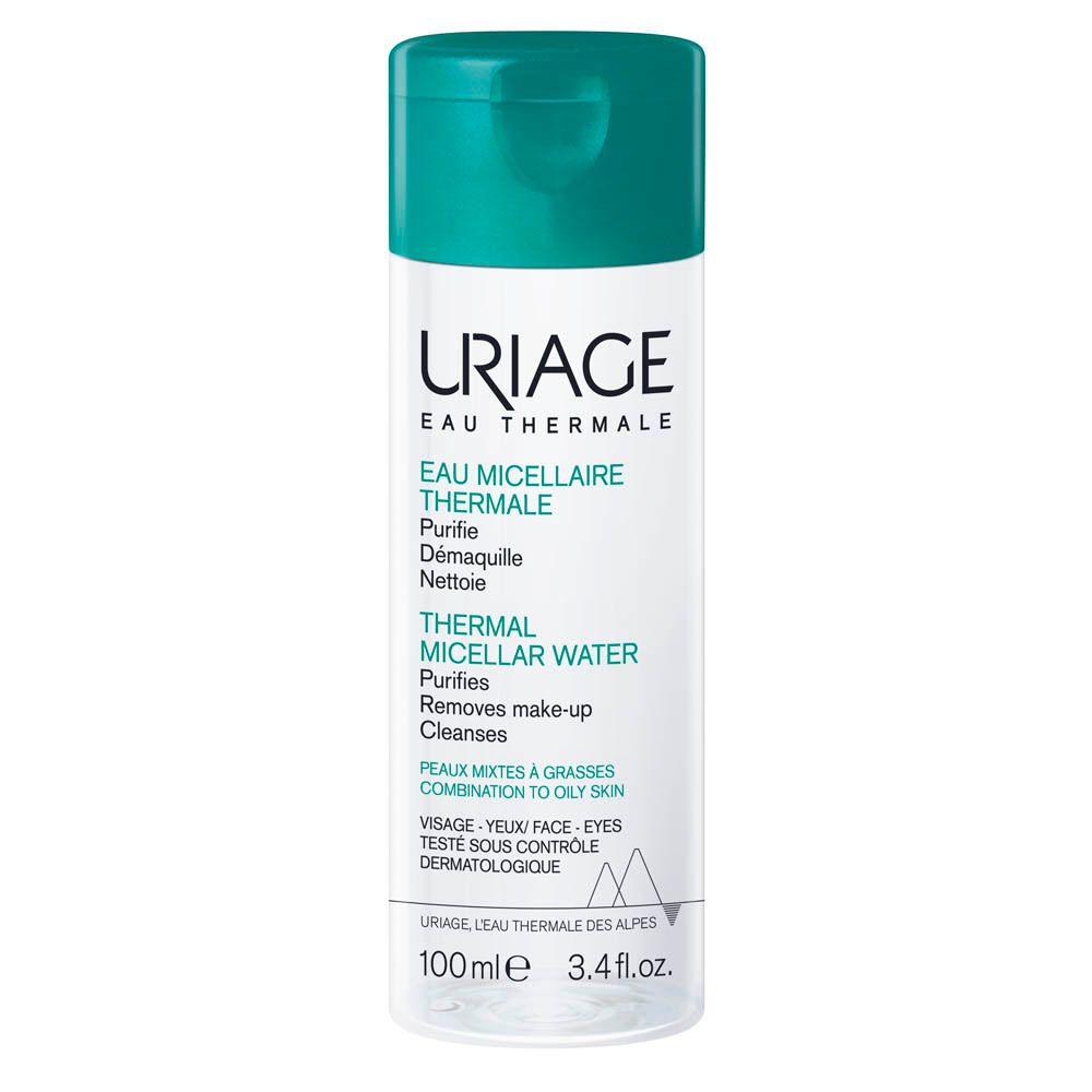 Flacon transparent, bouchon turquoise. Inscription: Uriage Eau Thermale, Thermal Micellar Water. Pour peaux mixtes à grasses.