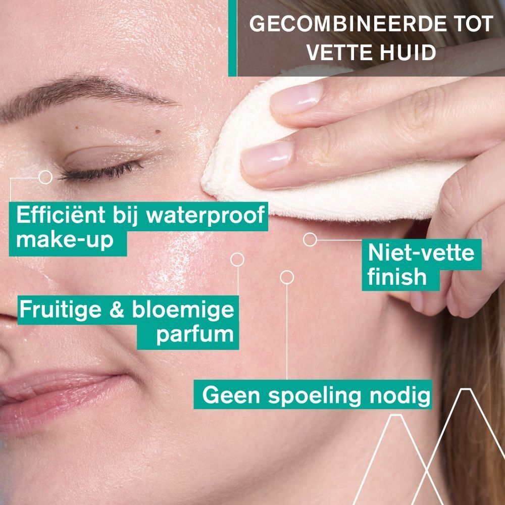 Vrouw reinigt gezicht met wattenschijfje. Tekst: Efficiënt bij waterproof make-up, fruitige geur, niet-vette finish, geen spoelen nodig.