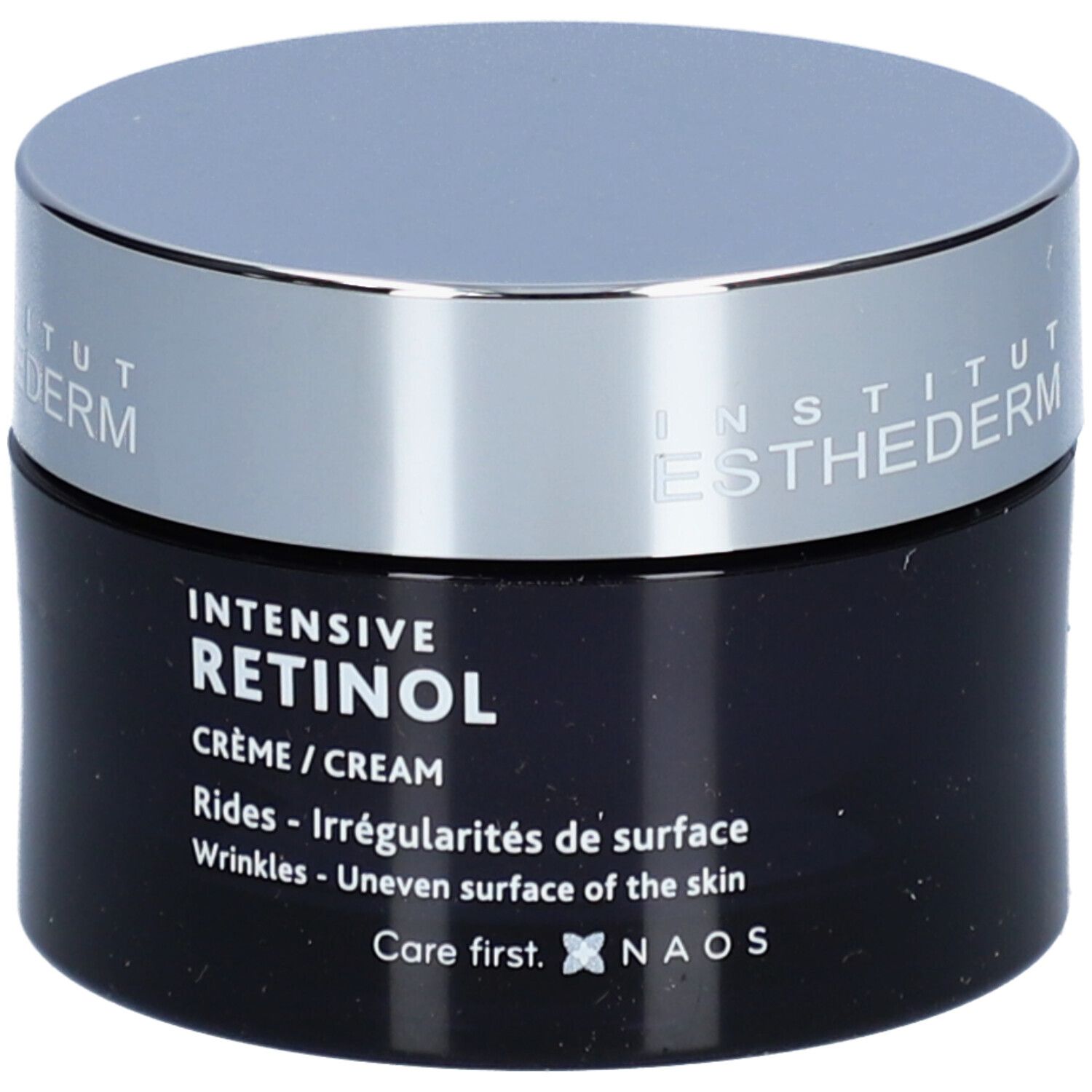 Donkerblauwe crèmepot met zilveren deksel. Opschrift: Institut Esthederm, Intensive Retinol Crème. Tegen rimpels en onregelmatigheden.
