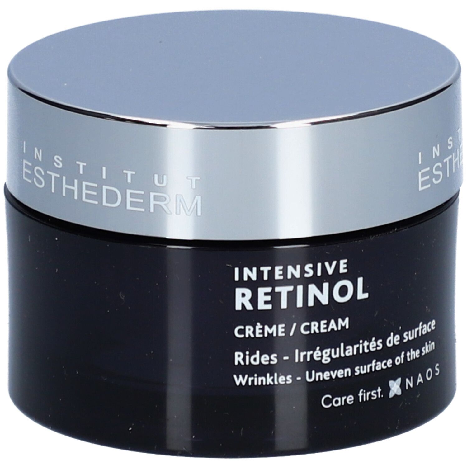 Donkerblauwe crèmepot met zilveren deksel. Opschrift: Institut Esthederm, Intensive Retinol Crème. Tegen rimpels en onregelmatigheden.