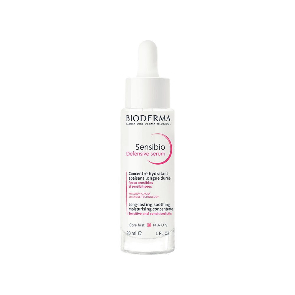 Flacon de sérum avec pipette. Verre blanc, bouchon blanc. Inscription : Bioderma Sensibio Defensiv Serum.