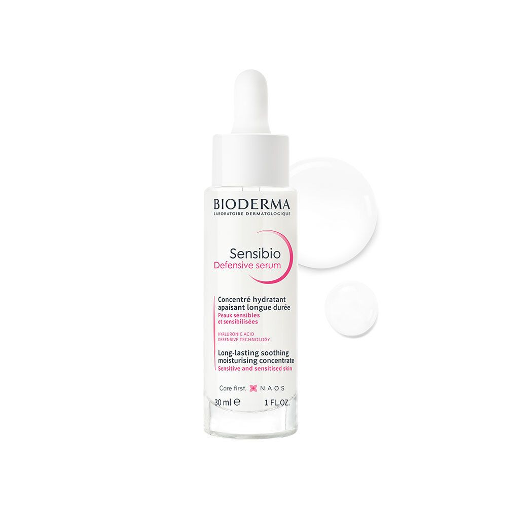 Flacon de sérum avec pipette. Verre blanc, bouchon blanc. Inscription : Bioderma Sensibio Defensiv Serum.