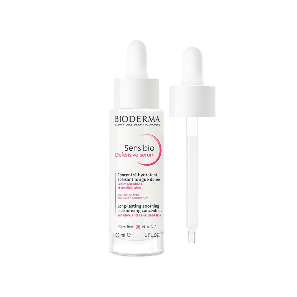 Flacon de sérum avec pipette. Verre blanc, bouchon blanc. Inscription : Bioderma Sensibio Defensiv Serum.
