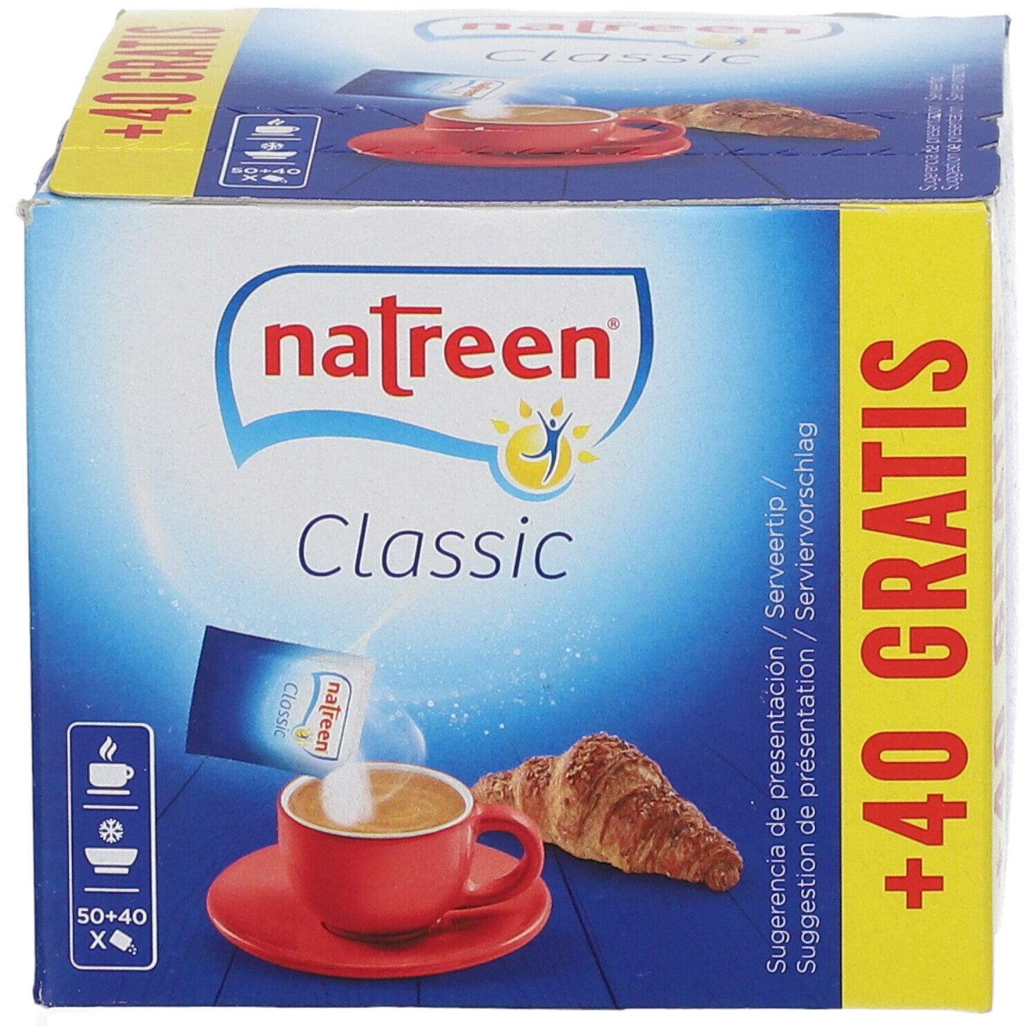 Natreen Classic Pulver Verpackung. Blaue Box mit Produktabbildung. Zeigt eine Tasse Kaffee mit Pulver und ein Croissant. +40 Gratis.
