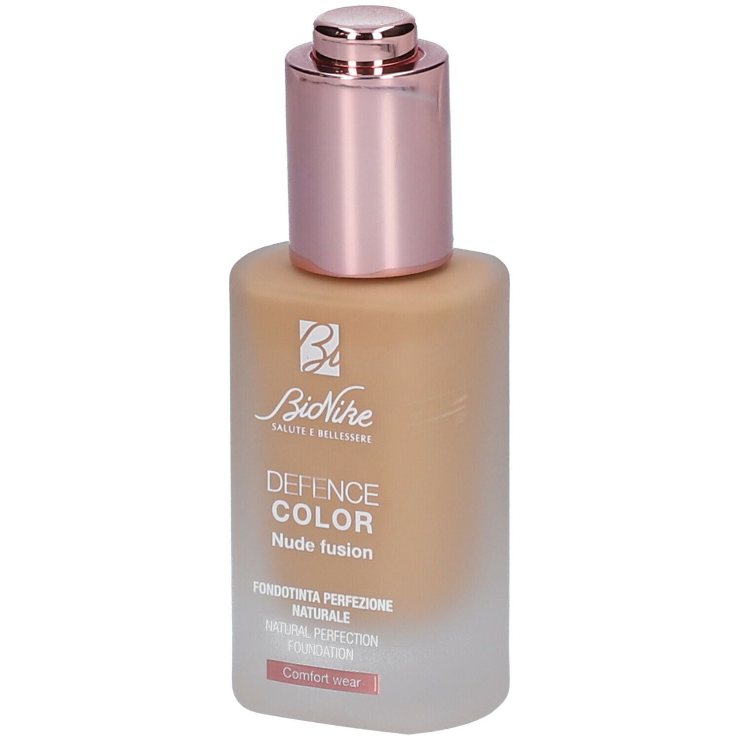 Foundationflesje. Roze dop en applicator. Opschrift: DEFENCE COLOR Nude fusion.