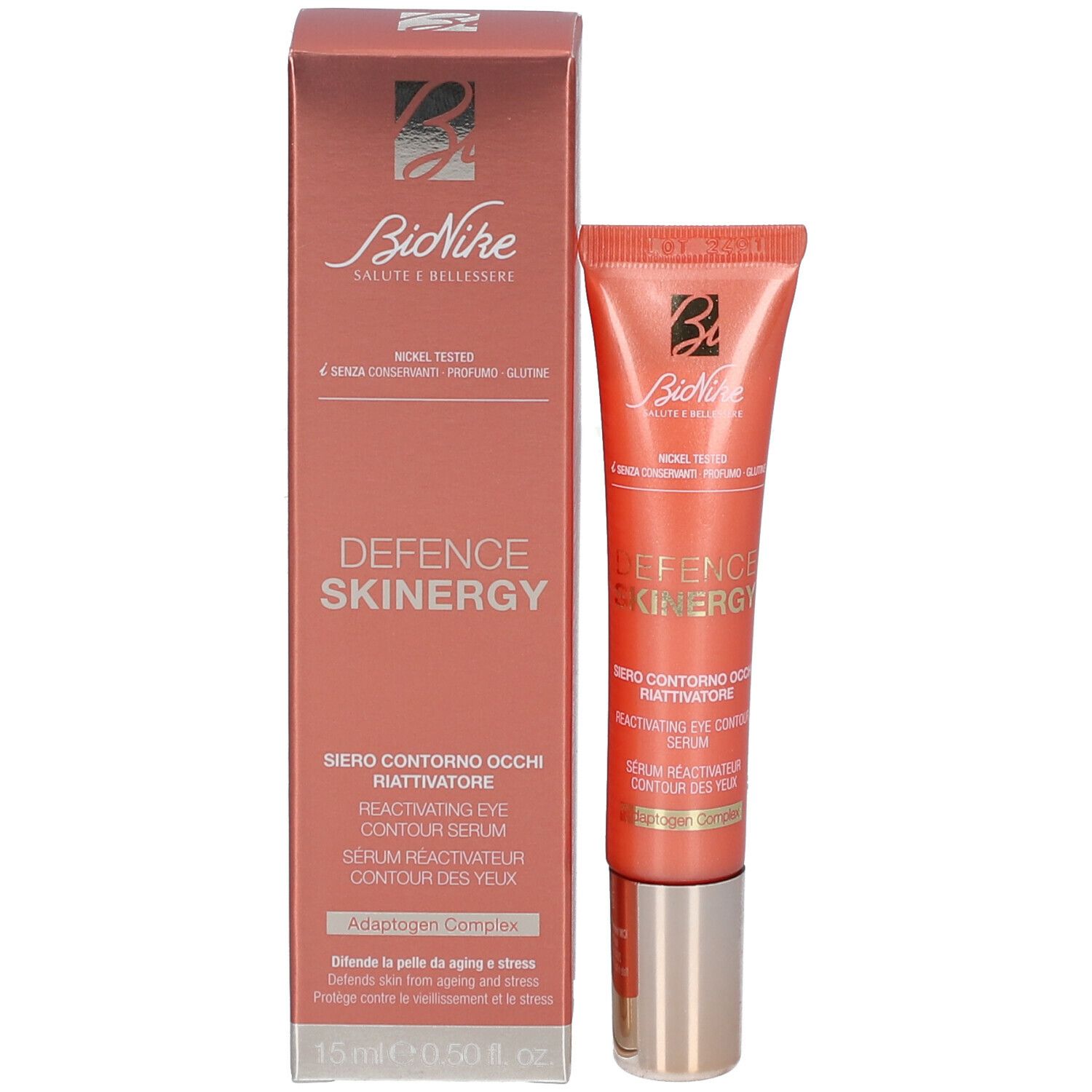 Produktverpackung mit Tube. Karton und Tube in Orange- und Weißtönen. Produktname und Marke sichtbar.
