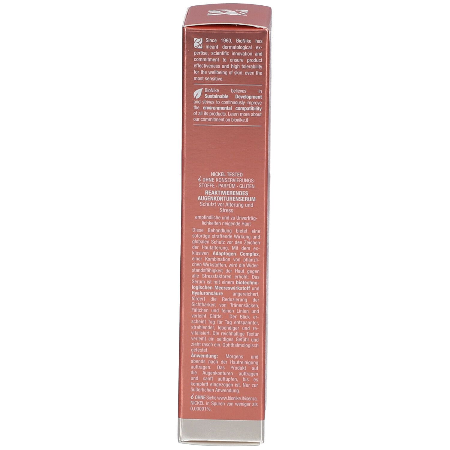 Rückseite der Produktverpackung. Text in mehreren Sprachen. Orangefarbener Hintergrund mit weißem Text.