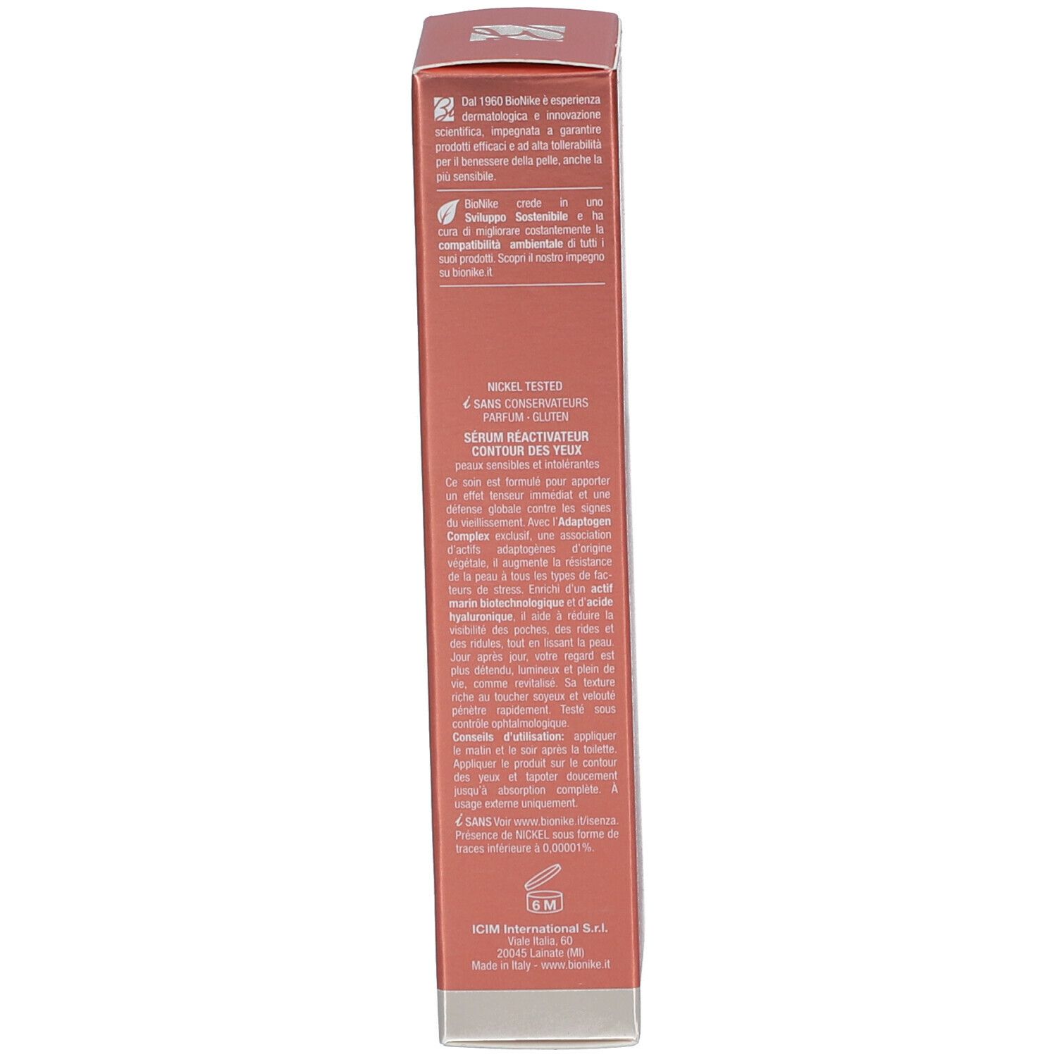 Seite der Produktverpackung. Text in mehreren Sprachen. Orangefarbener Hintergrund mit weißem Text.