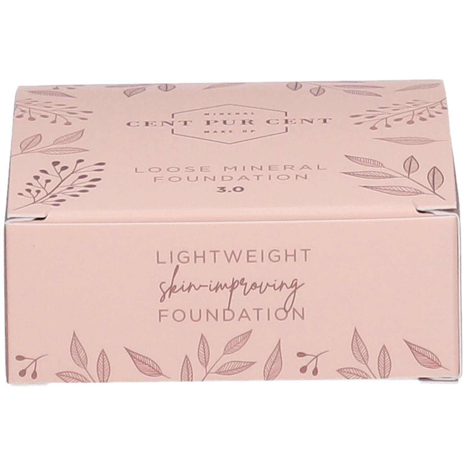 Boîte rose avec informations produit. Inscription: Cent Pur Cent, Loose Mineral Foundation, Lightweight skin-improving Foundation.