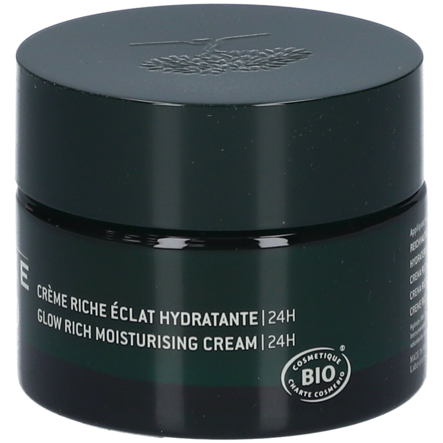 Donkergroene crème pot met deksel. Tekst: Crème Riche Éclat Hydratante, Glow Rich Moisturising Cream, 24H. Bio certificering.