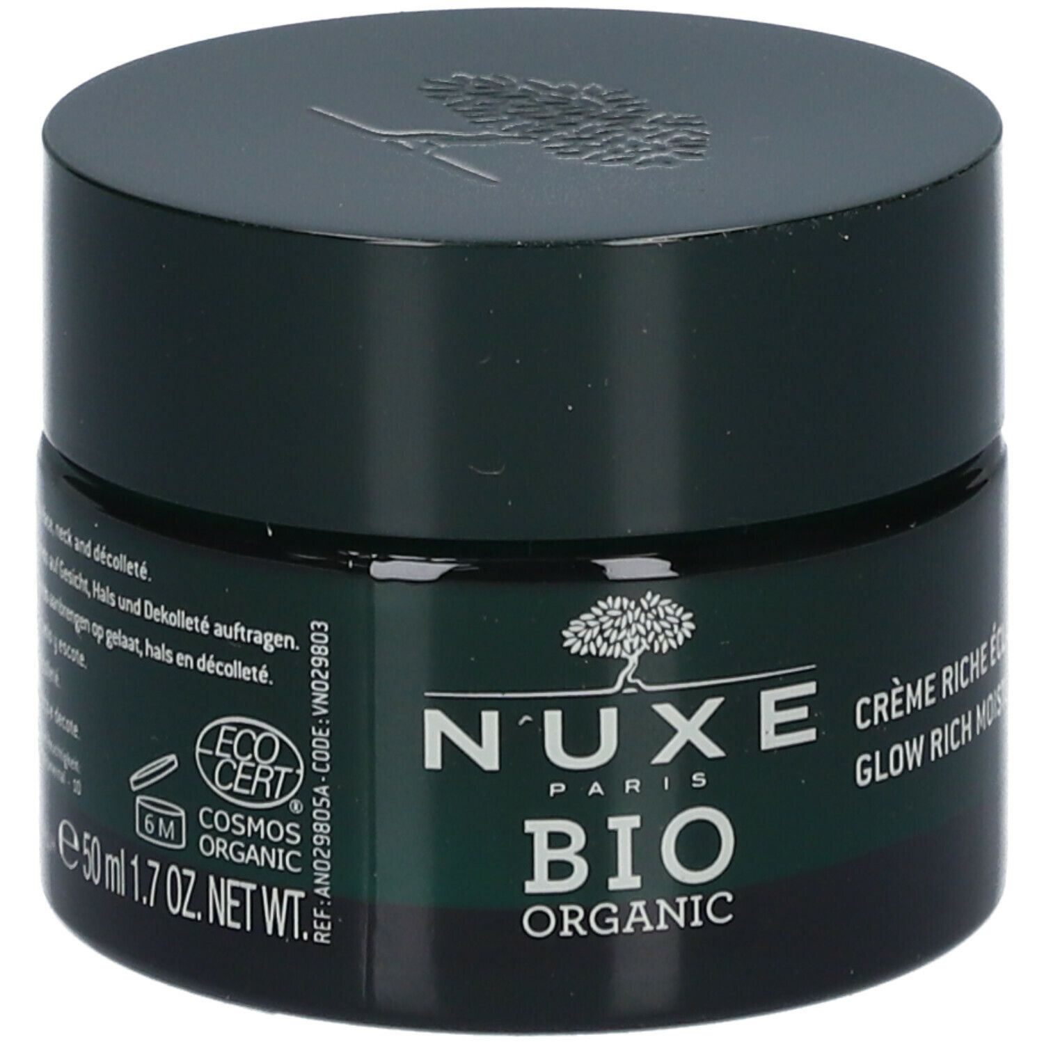 Donkergroene crème pot met deksel. Tekst: Nuxe Bio Organic, Crème Riche Éclat Hydratante, 50 ml, 1.7 oz. NET. ECOCERT COSMOS ORGANIC.