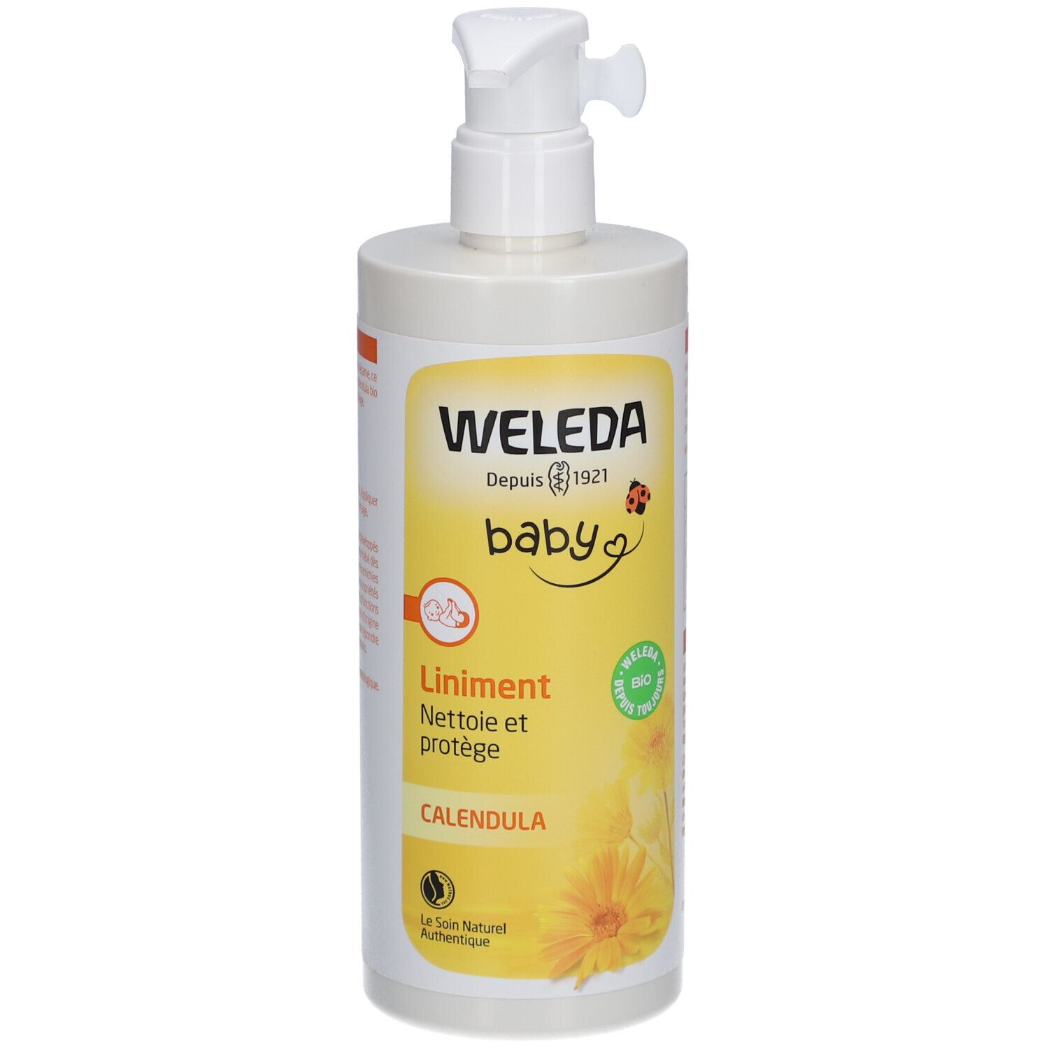 Flacon de liniment Weleda Baby avec pompe. Étiquette jaune et blanche. Informations produit et logo.