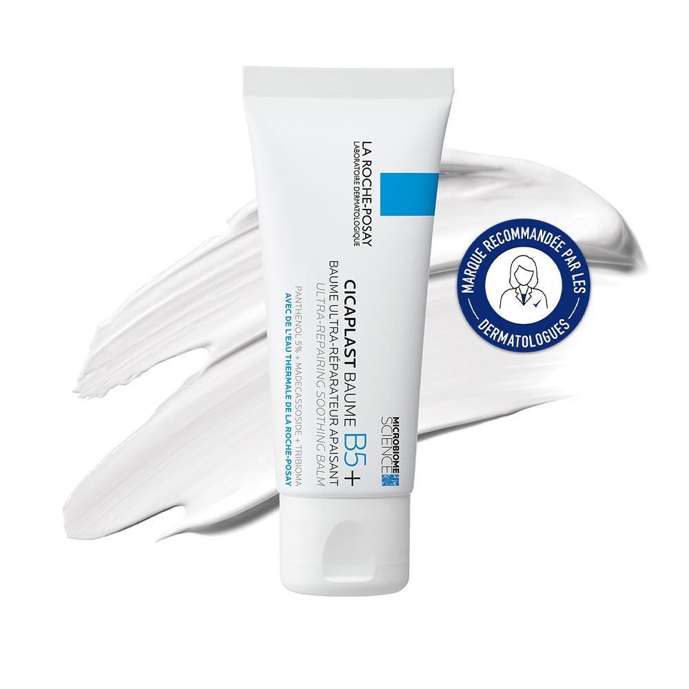 Tube blanc avec accent bleu. Texte : La Roche-Posay, Cicaplast Baume B5+. Logo et sceau.