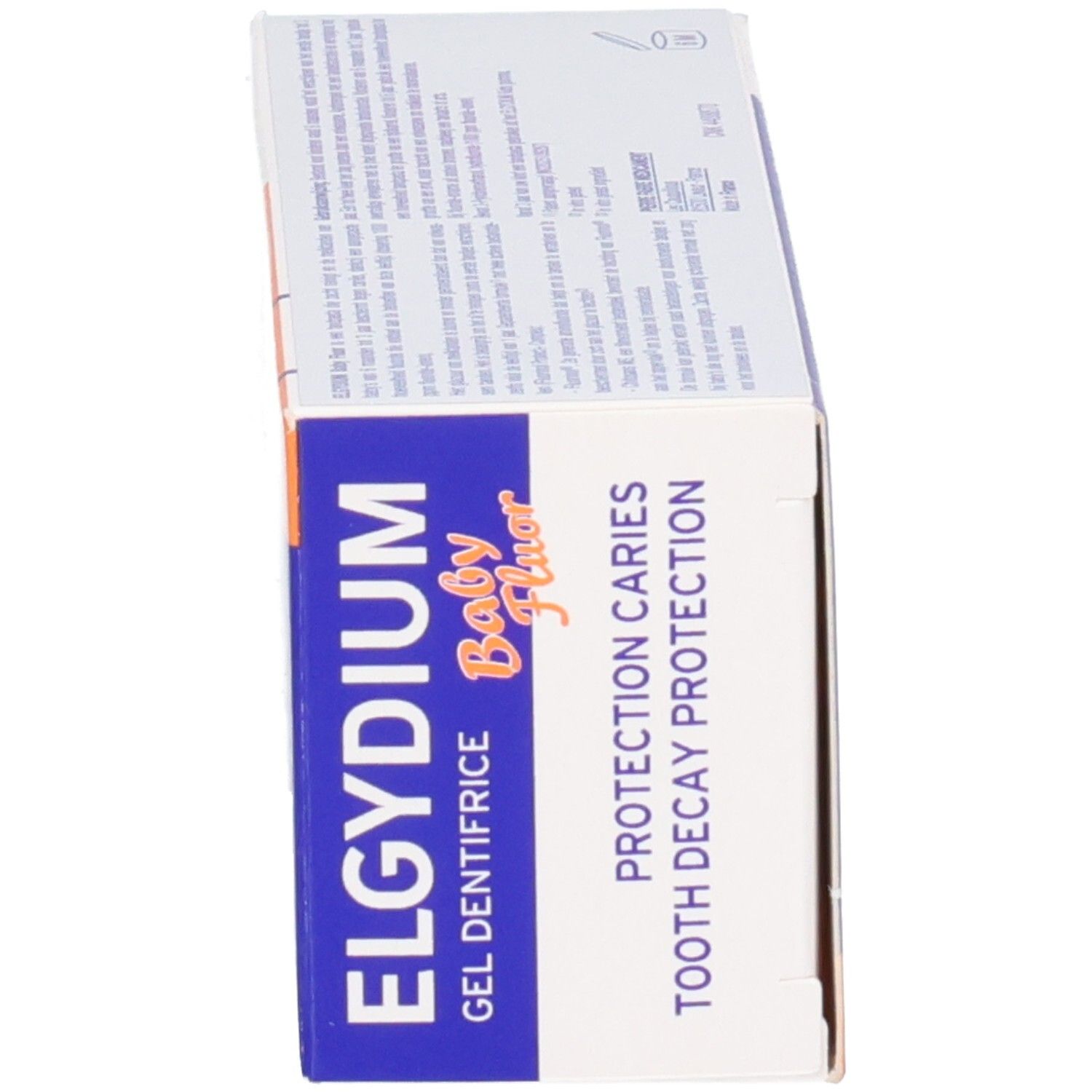 Seite der Elgydium Baby Fluor Zahnpasta-Gel Verpackungsbox mit Informationen zum Kariesschutz.