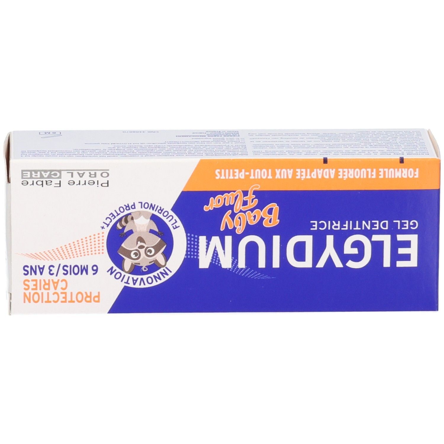 Elgydium Baby Fluor Zahnpasta-Gel Verpackungsbox mit Waschbär-Logo und Hinweisen zum Kariesschutz.