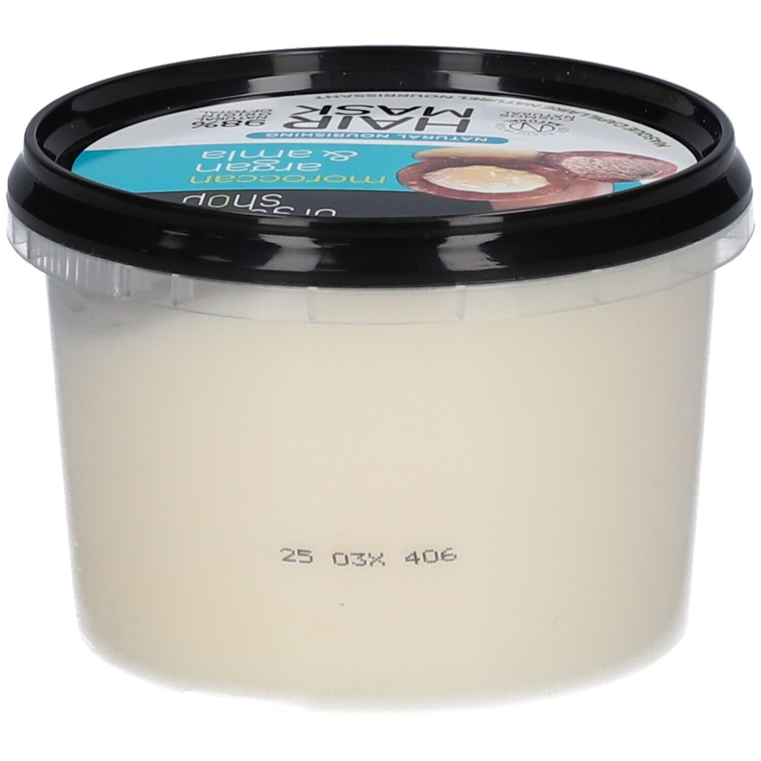 Haarmaske in einem transparenten Behälter mit schwarzem Deckel. Auf dem Etikett steht "Moroccan Argan & Amla" und ein Verfallsdatum.