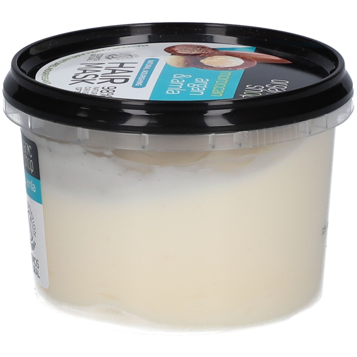 Haarmaske in einem transparenten Behälter mit schwarzem Deckel. Das Etikett zeigt "Moroccan Argan & Amla".