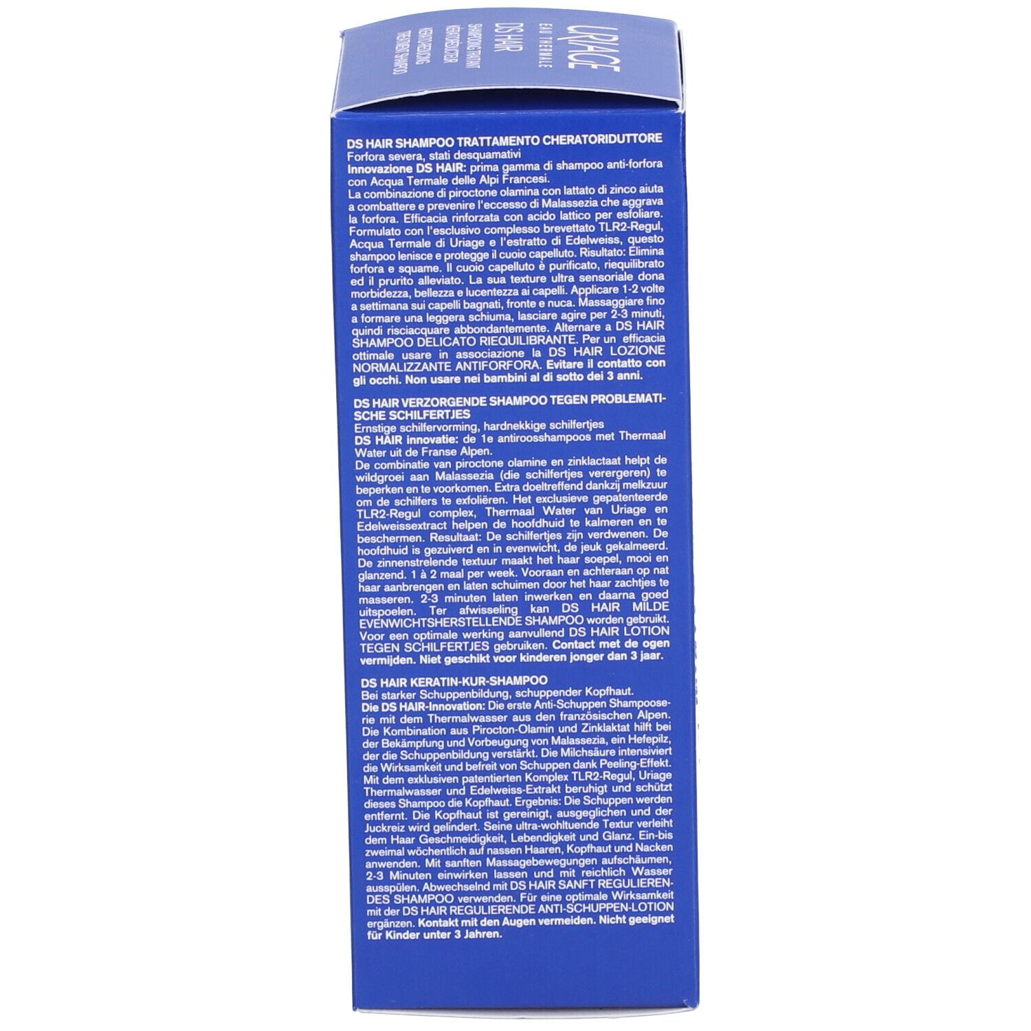 Boîte bleue. Texte sur DS Hair Shampooing Traitant Kératoréducteur. Plusieurs langues.