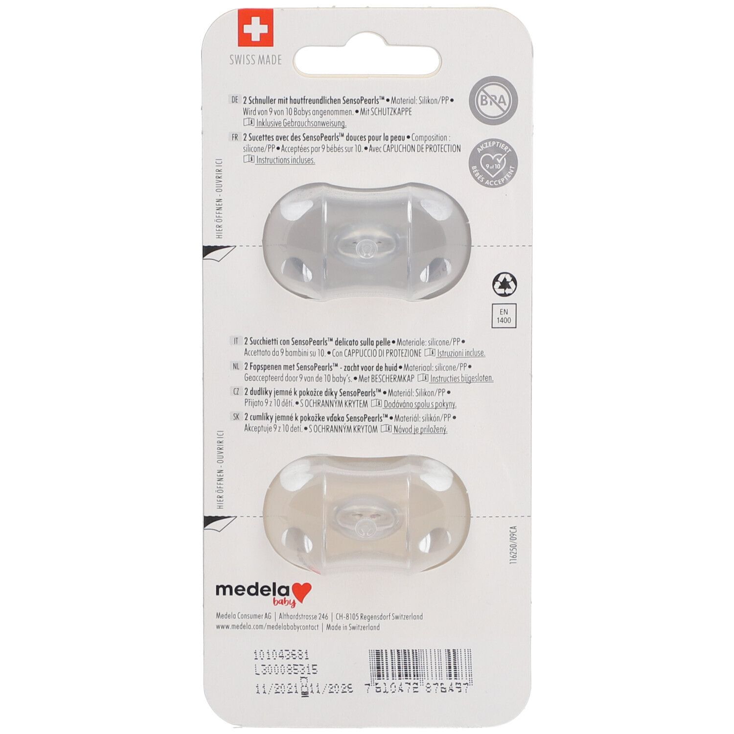 Rückseite der Verpackung mit zwei Schnullern. Text: Medela Baby, Informationen in Deutsch, Englisch, Französisch, Italienisch.