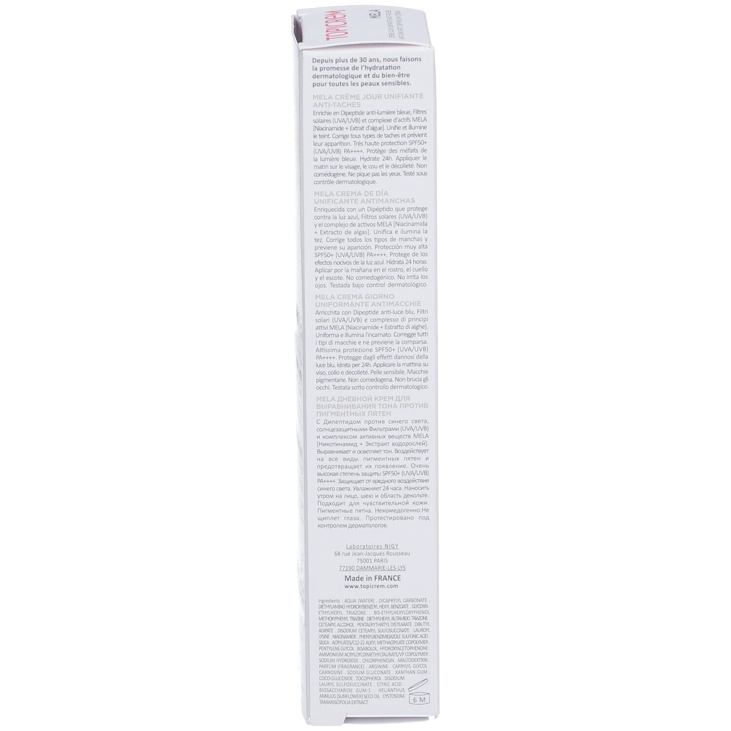 Rückseite der weißen Verpackung. Text in mehreren Sprachen. Produktname: MELA Anti-Dark Spot Day Cream. Hergestellt in Frankreich.